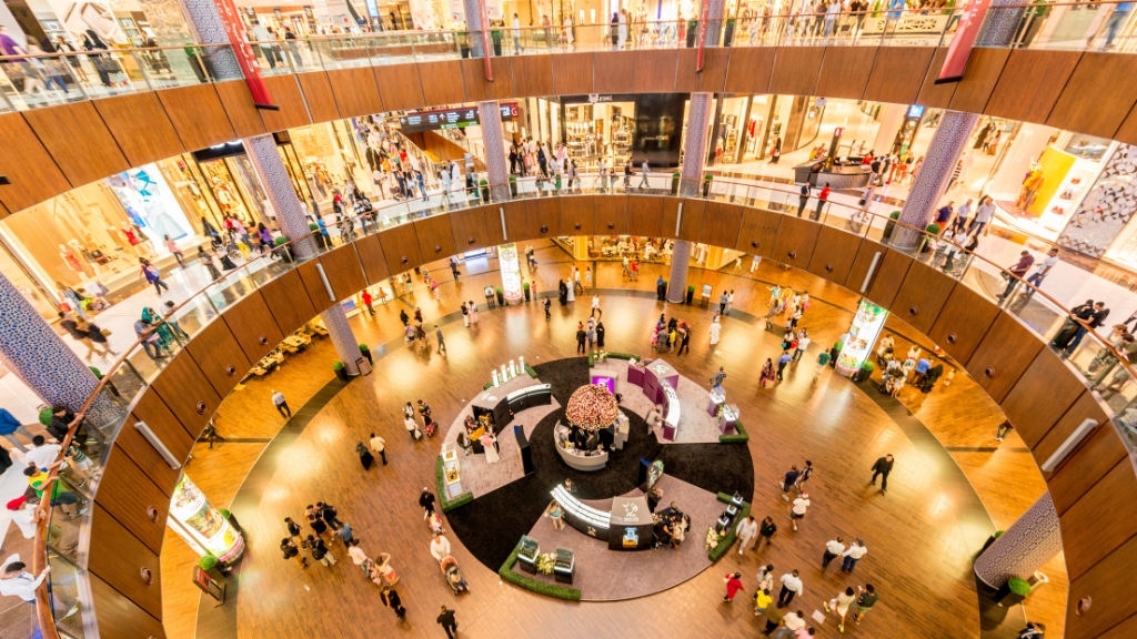 view of crowded malls multiple levels of shops