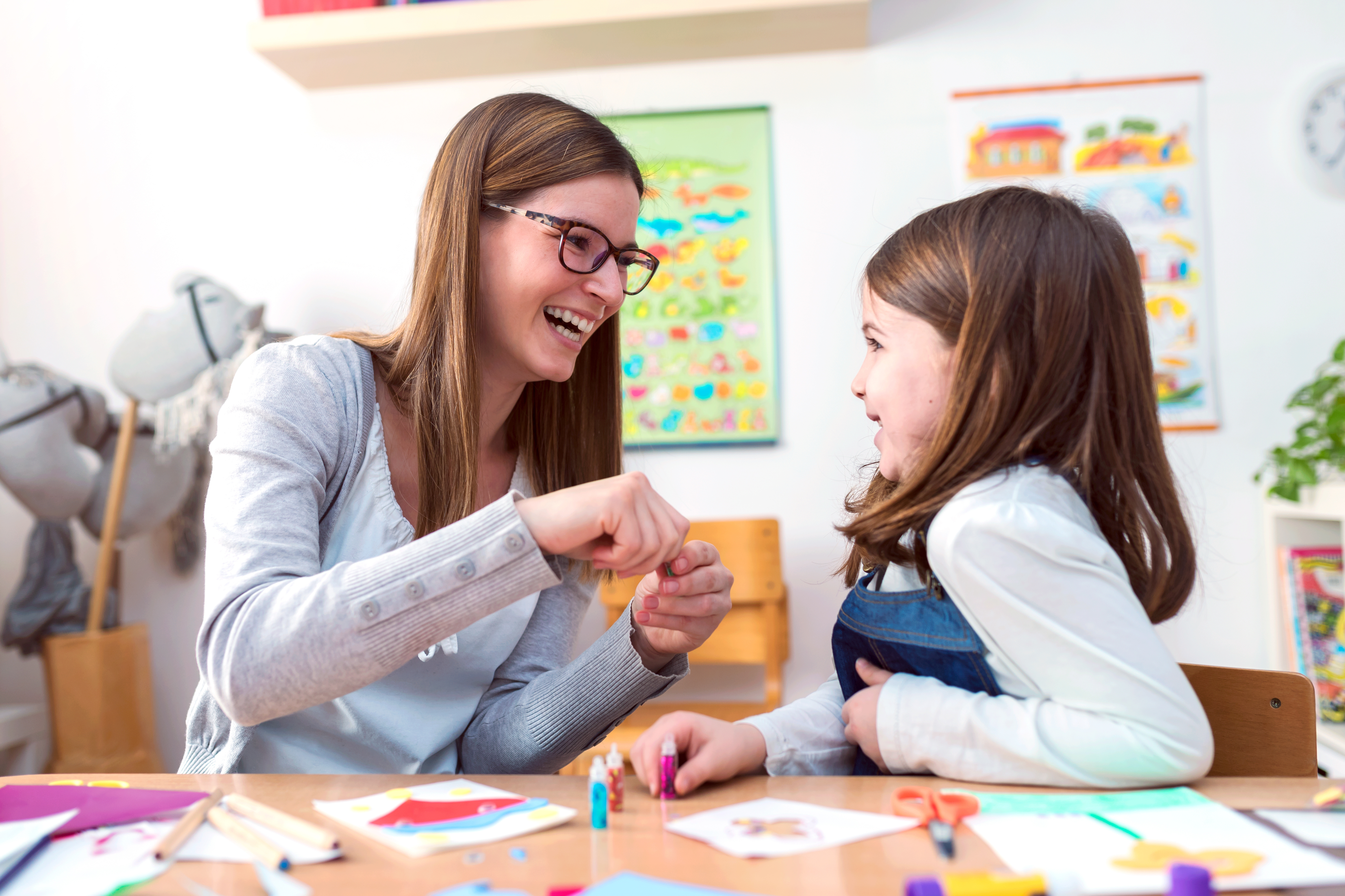 Woman and child doing artwork