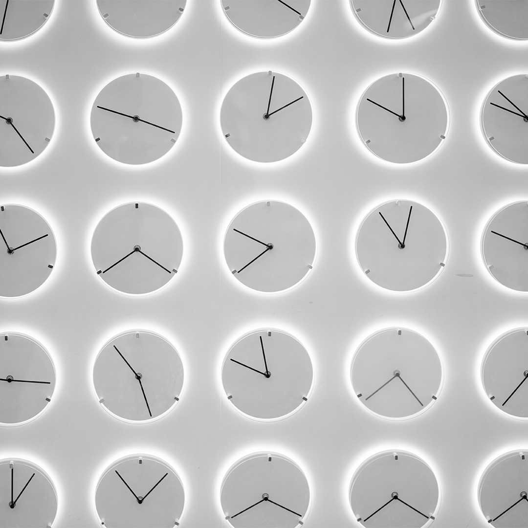 Multiple clocks set to various times depicting the ability to set your own pace