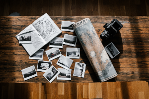 Photos, Map, Camera on Desk