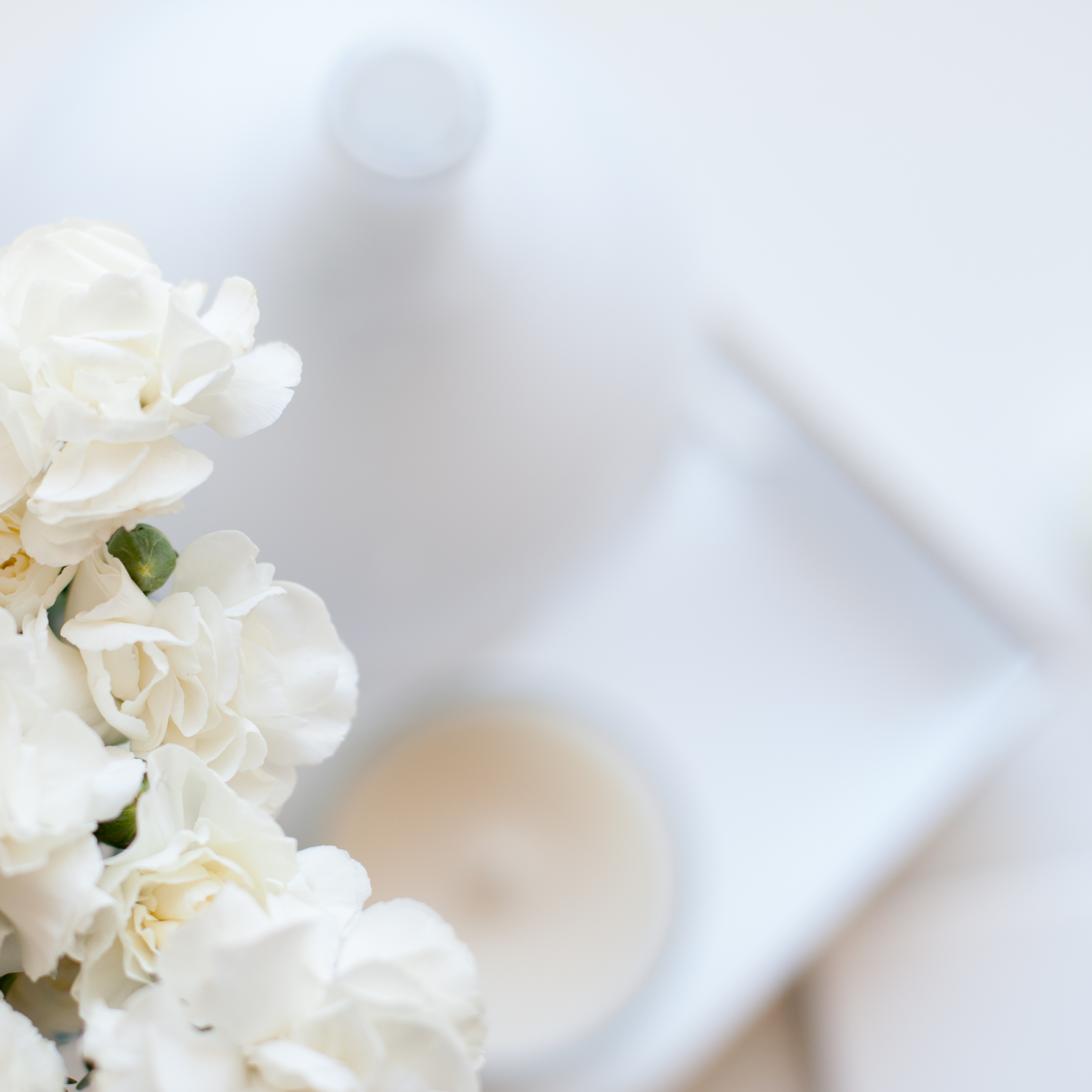 flowers and a journal on a table