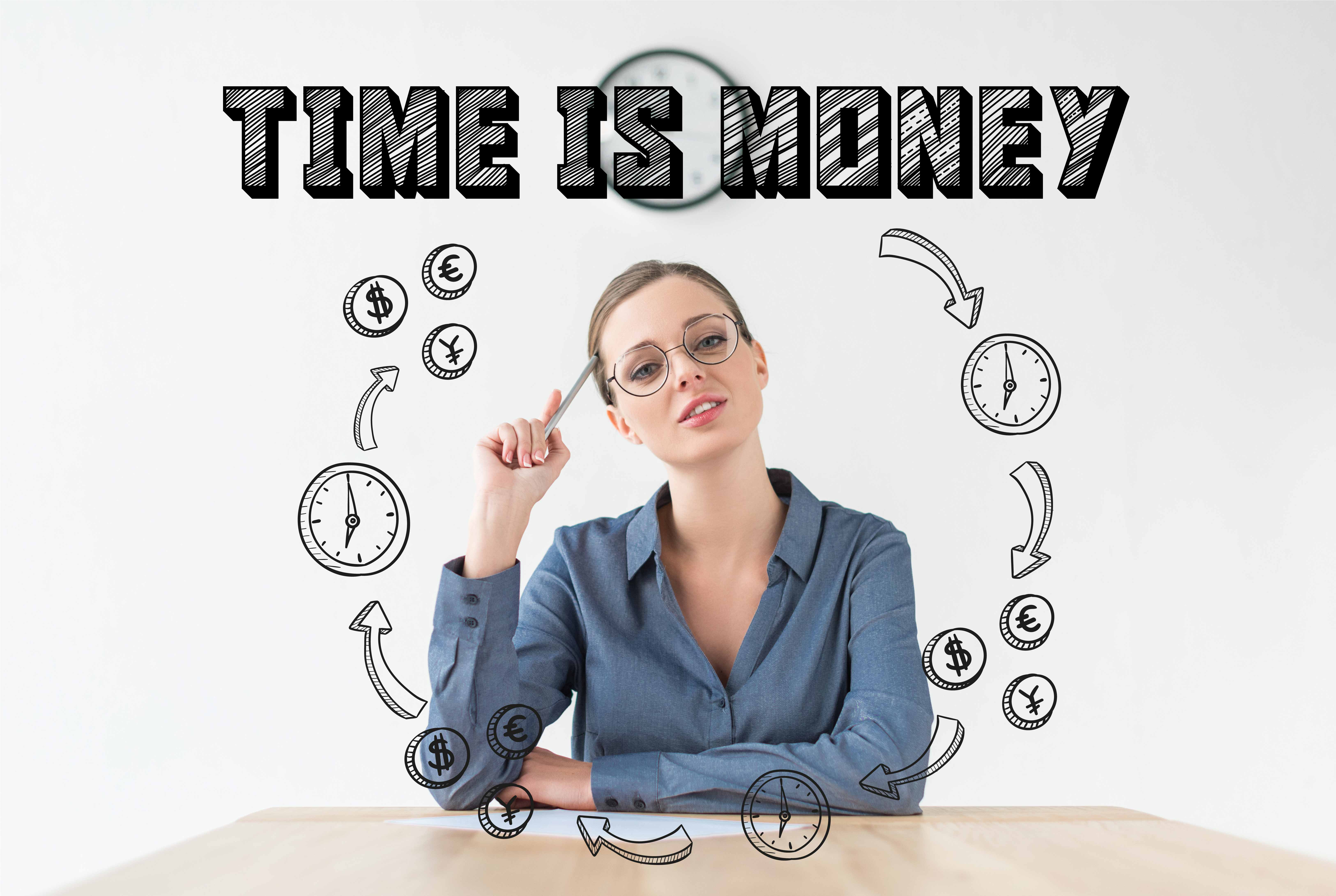 Business woman sitting at desk surrounded by icons of clocks and money symbols with the words time is money above her head.