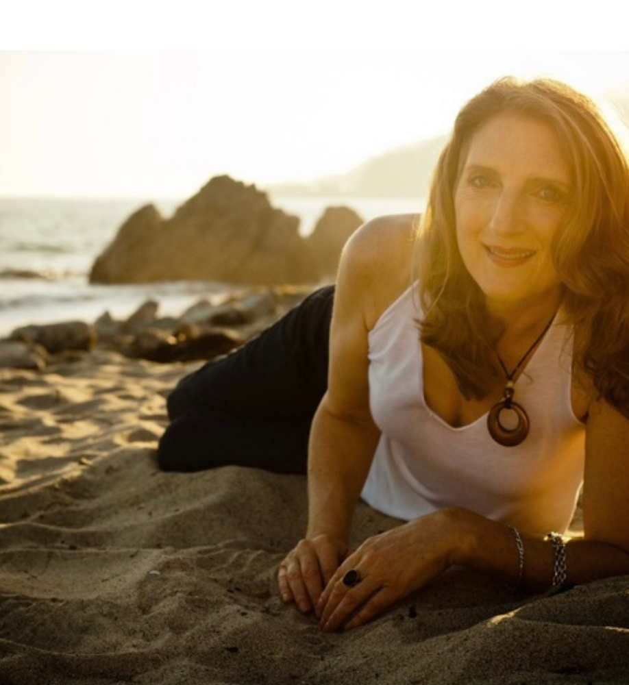 sharon otness posing at the beach