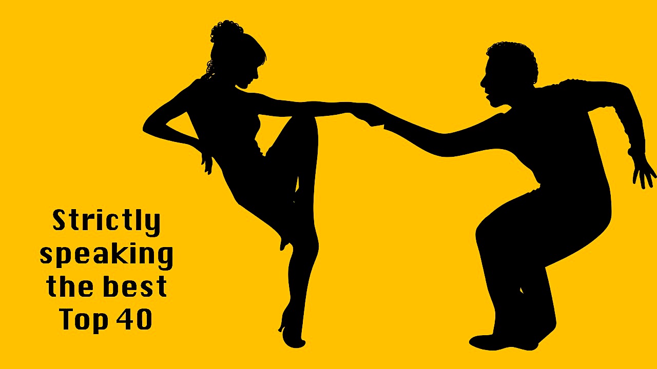Silhouette of man and woman dancing the Jive