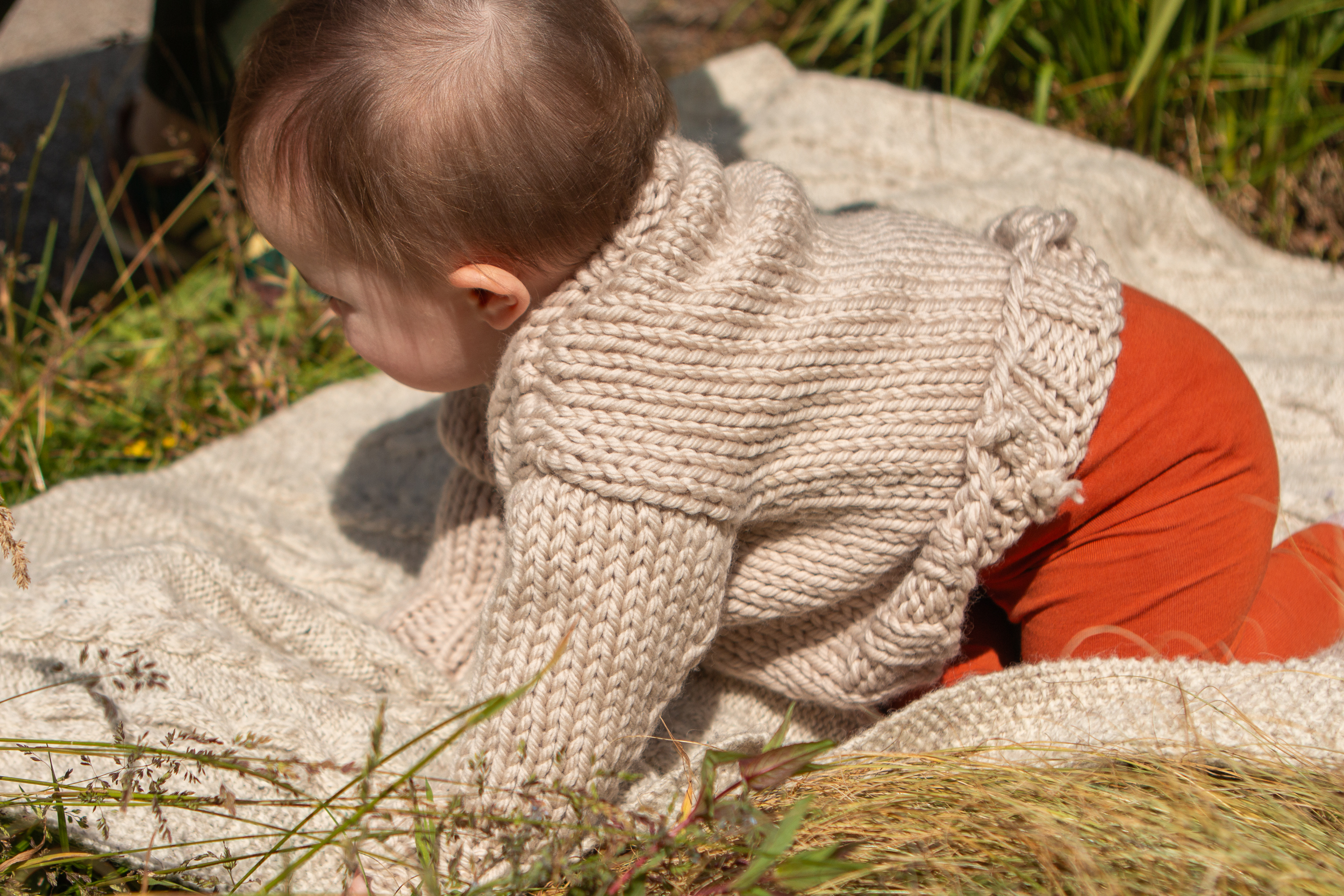 Baby wearing Fornida Sweater