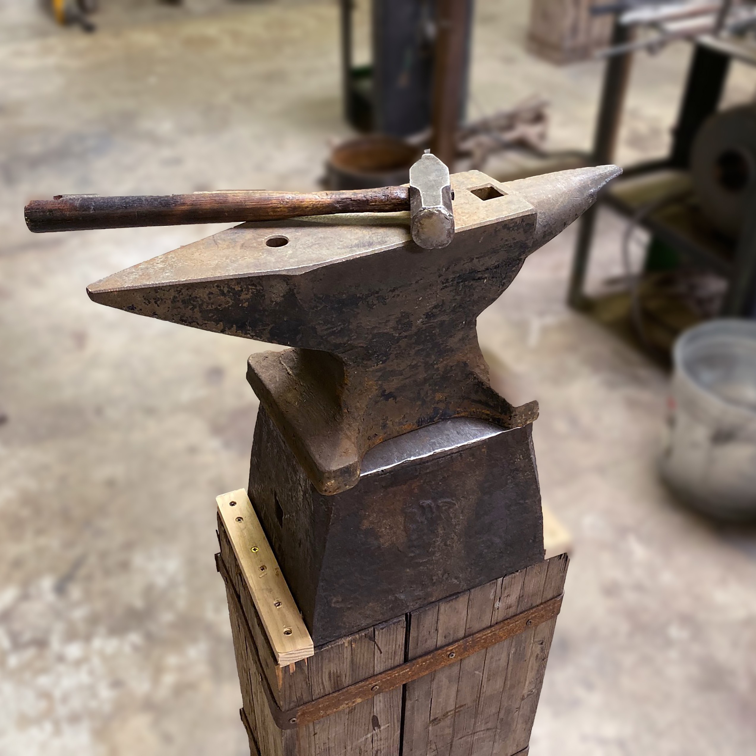 blacksmithing forge anvil and hammer