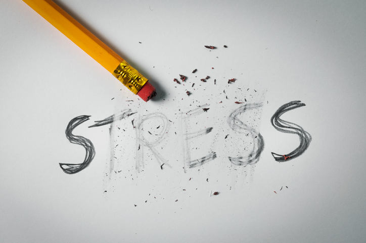 Pencil erasing the word stress