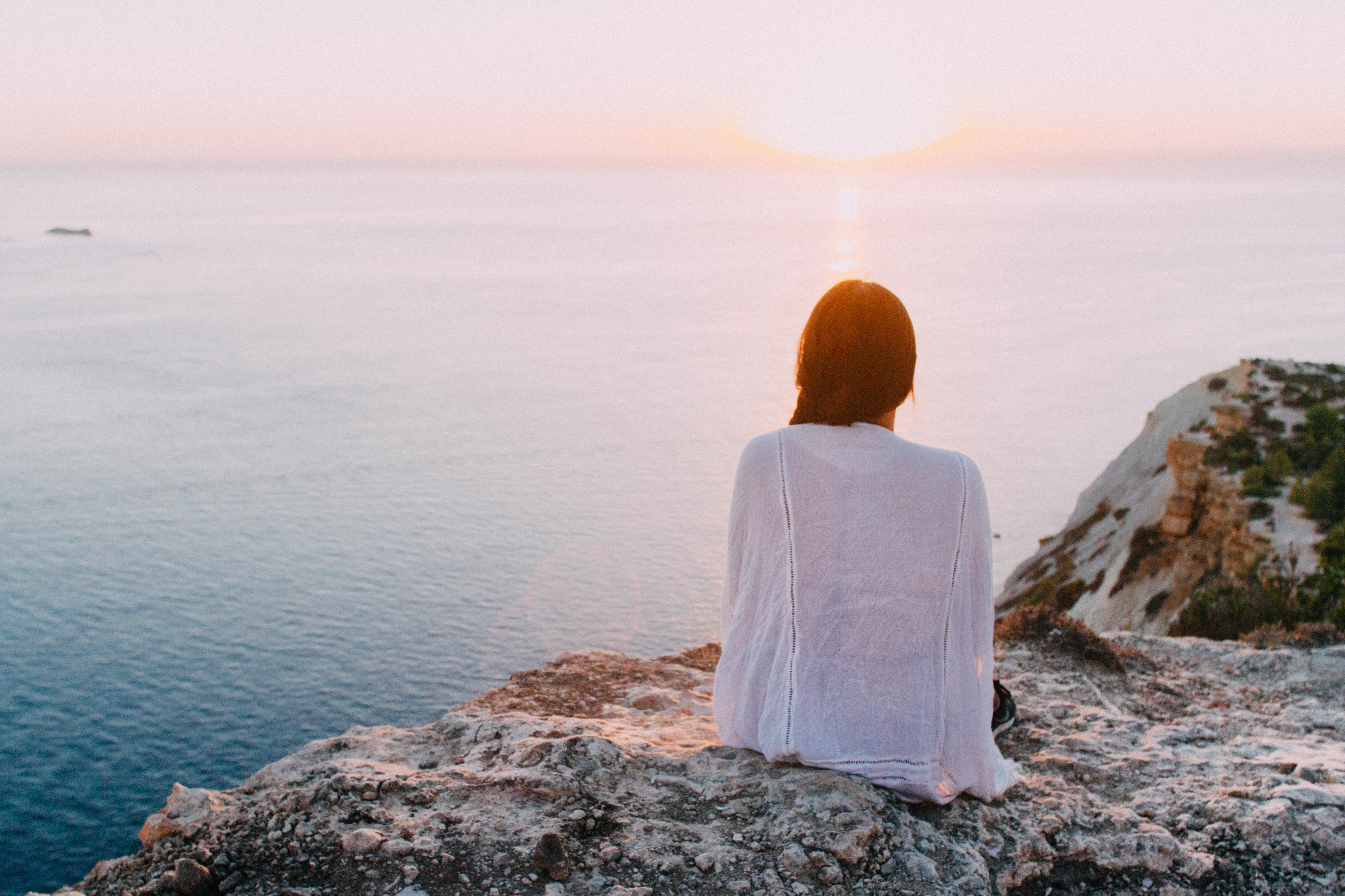 woman staring out over the water