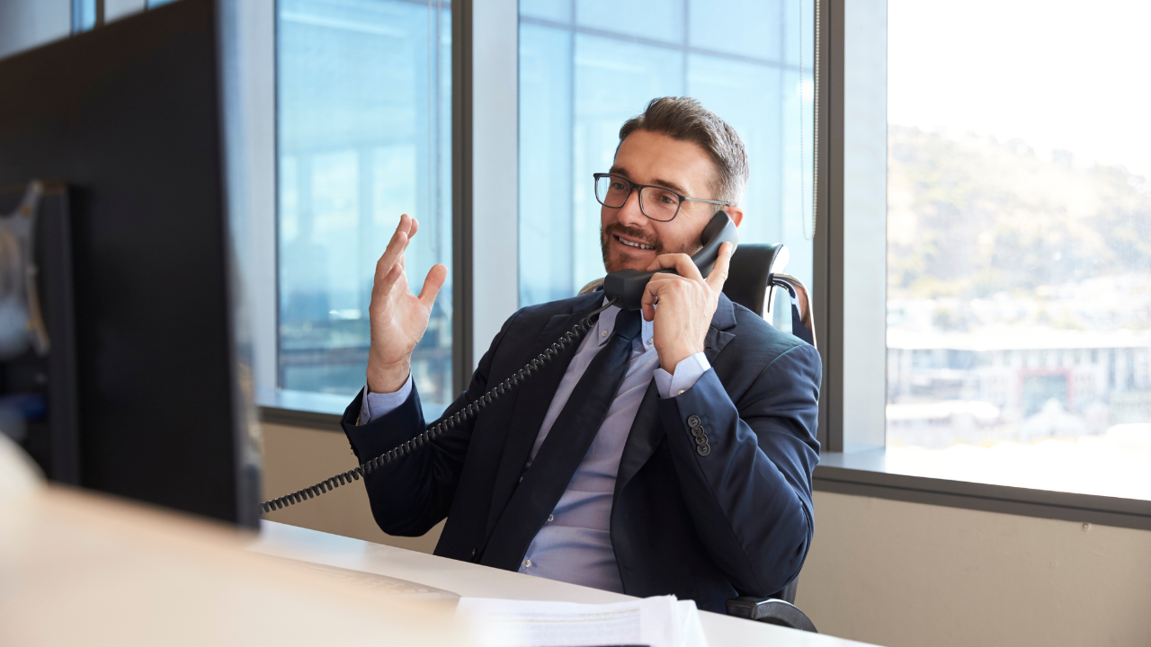 business man talking on telephone