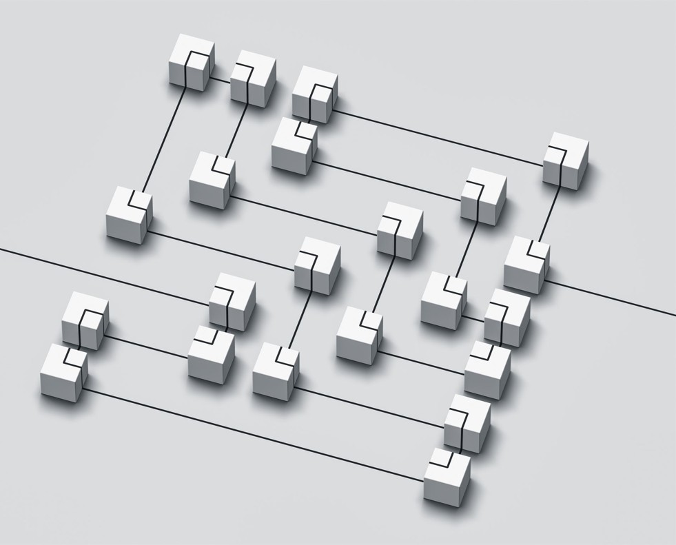 A single line drawn out symmetrically horizontally and vertically over paper and blocks to demonstrate direction and structure