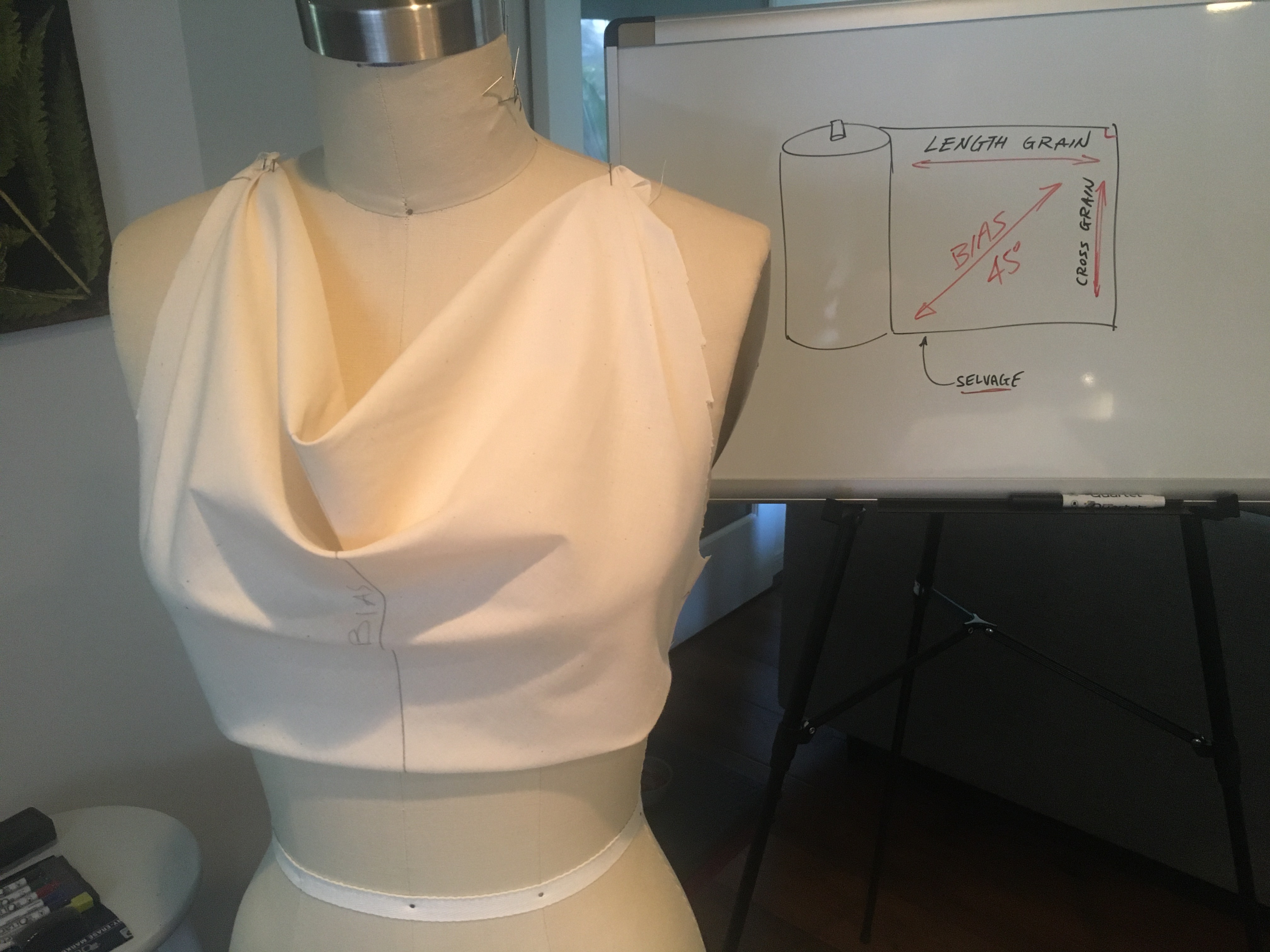 Cowl neckline in fashion designing.