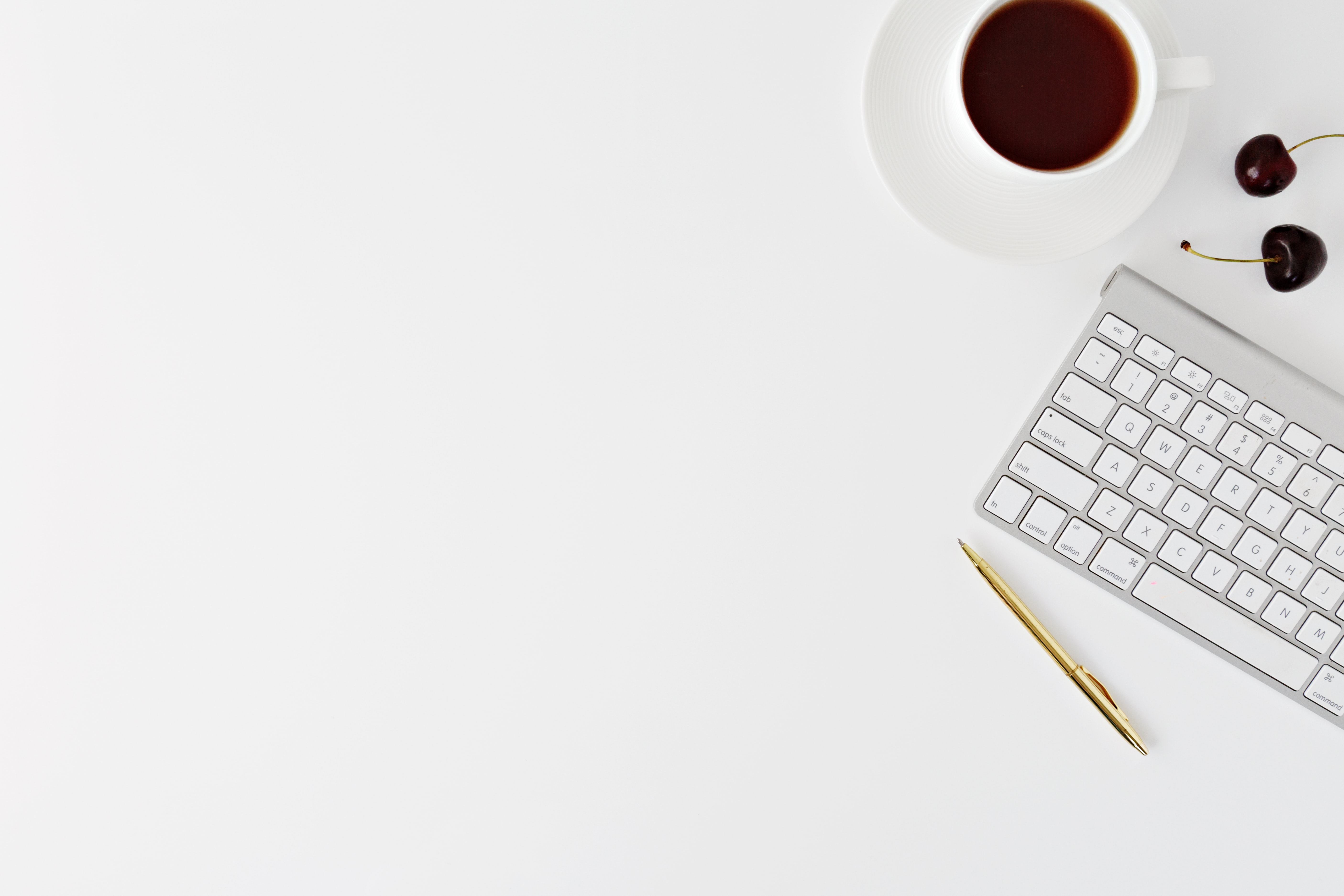 desk with computer and coffee