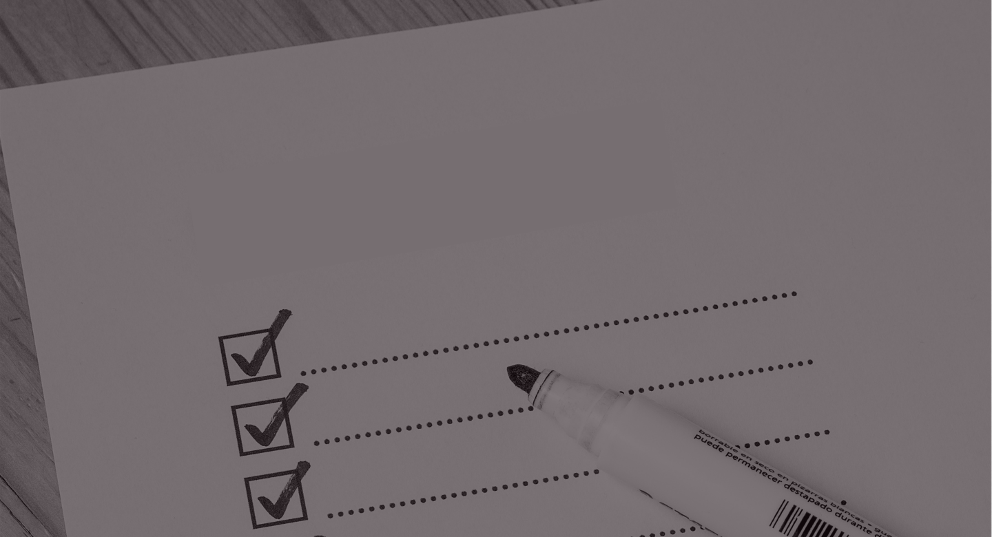 Checklist and marker on desk