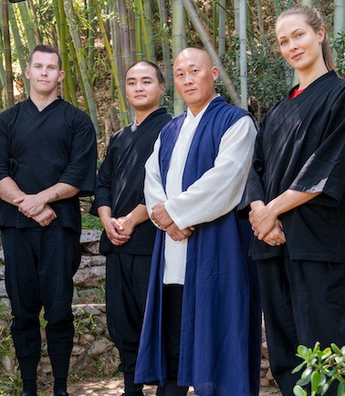 Shaolin Qigong Grand Master Shi Yanxu with his students
