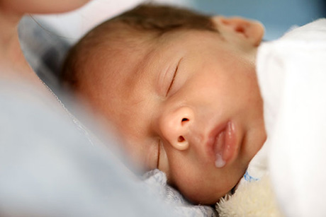 close up of baby after breastfeeding