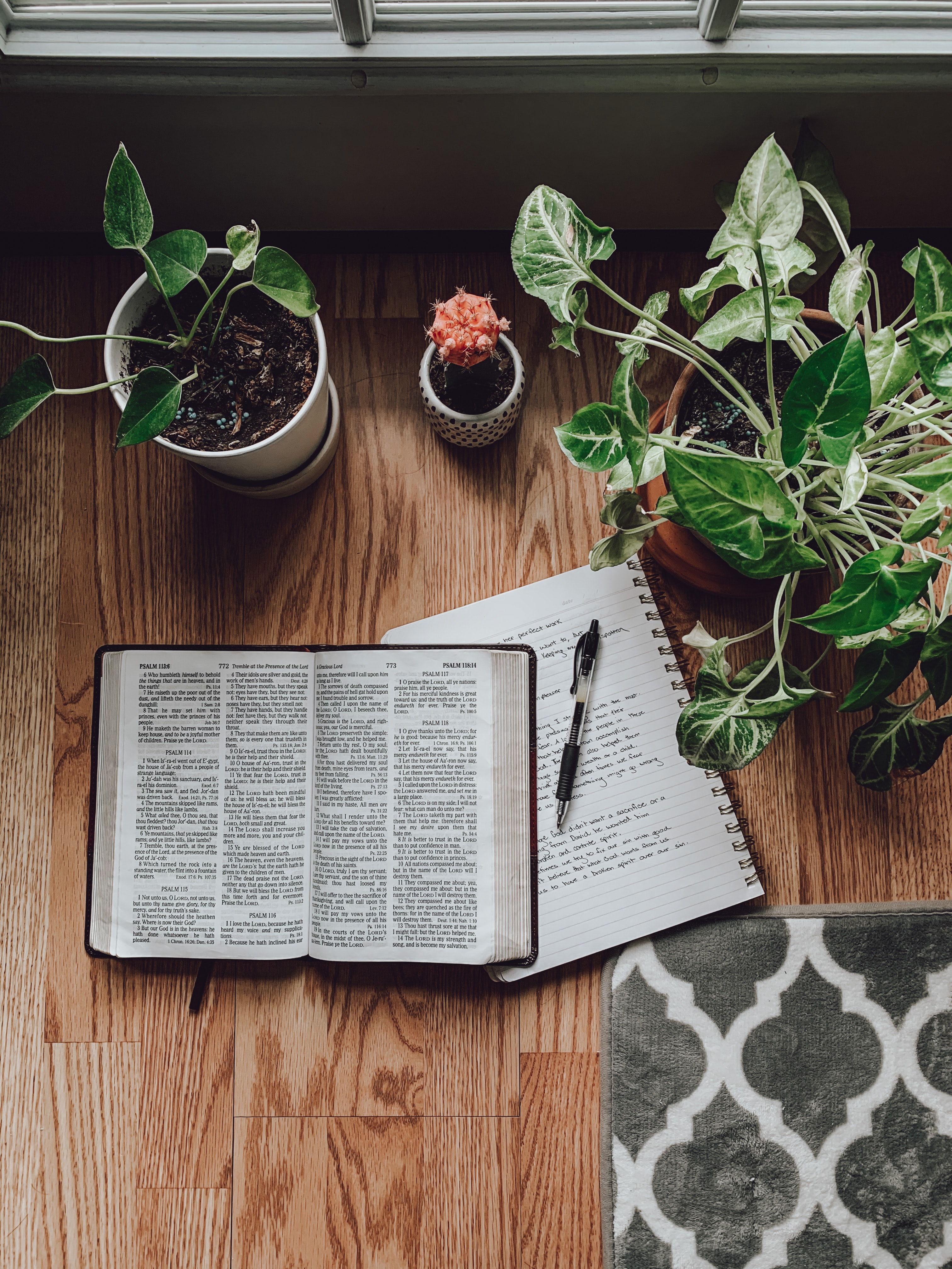 Photo of Bible and notebook by Rachel Strong on Unsplash