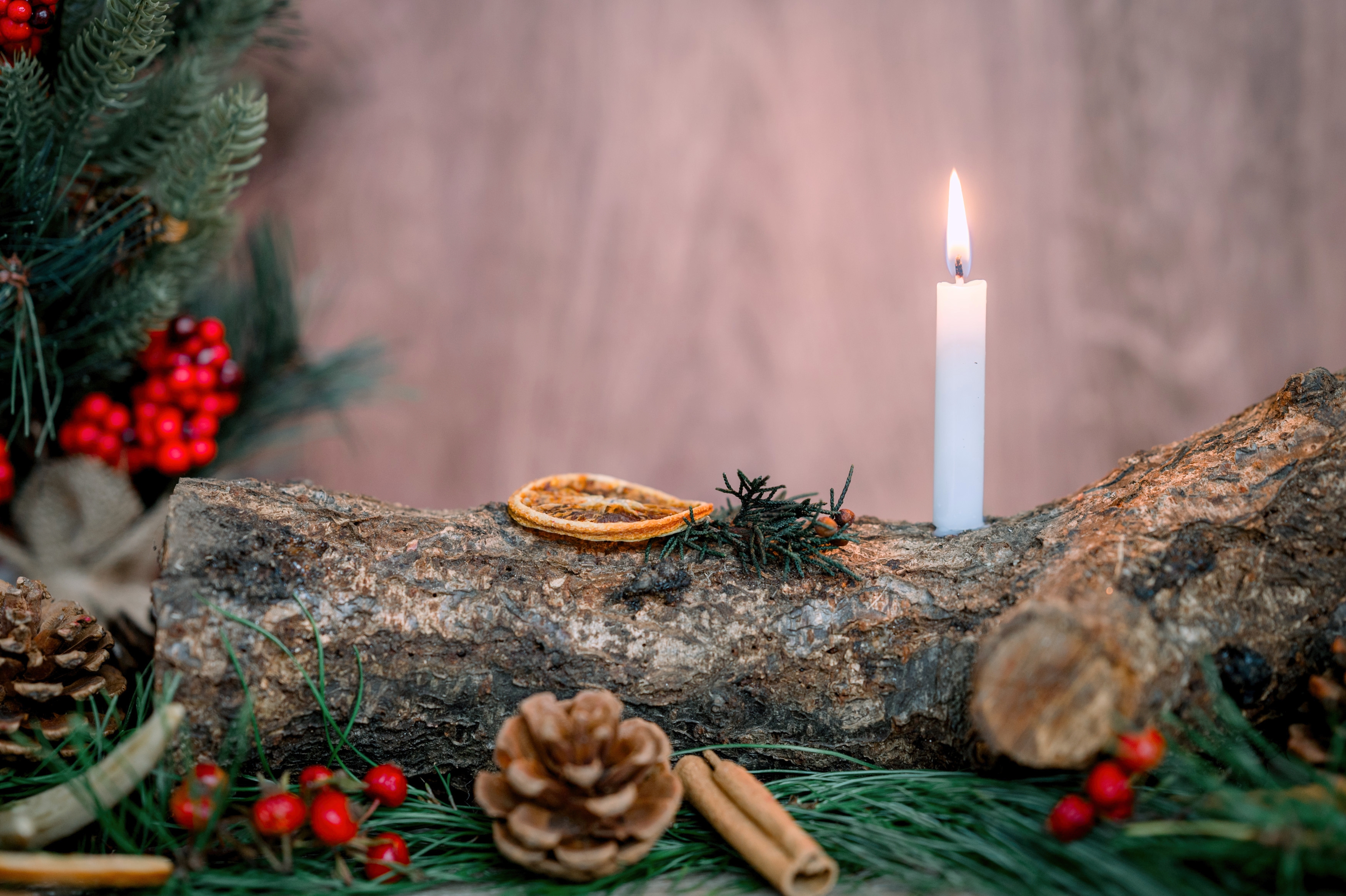 Yule log, burning white candle