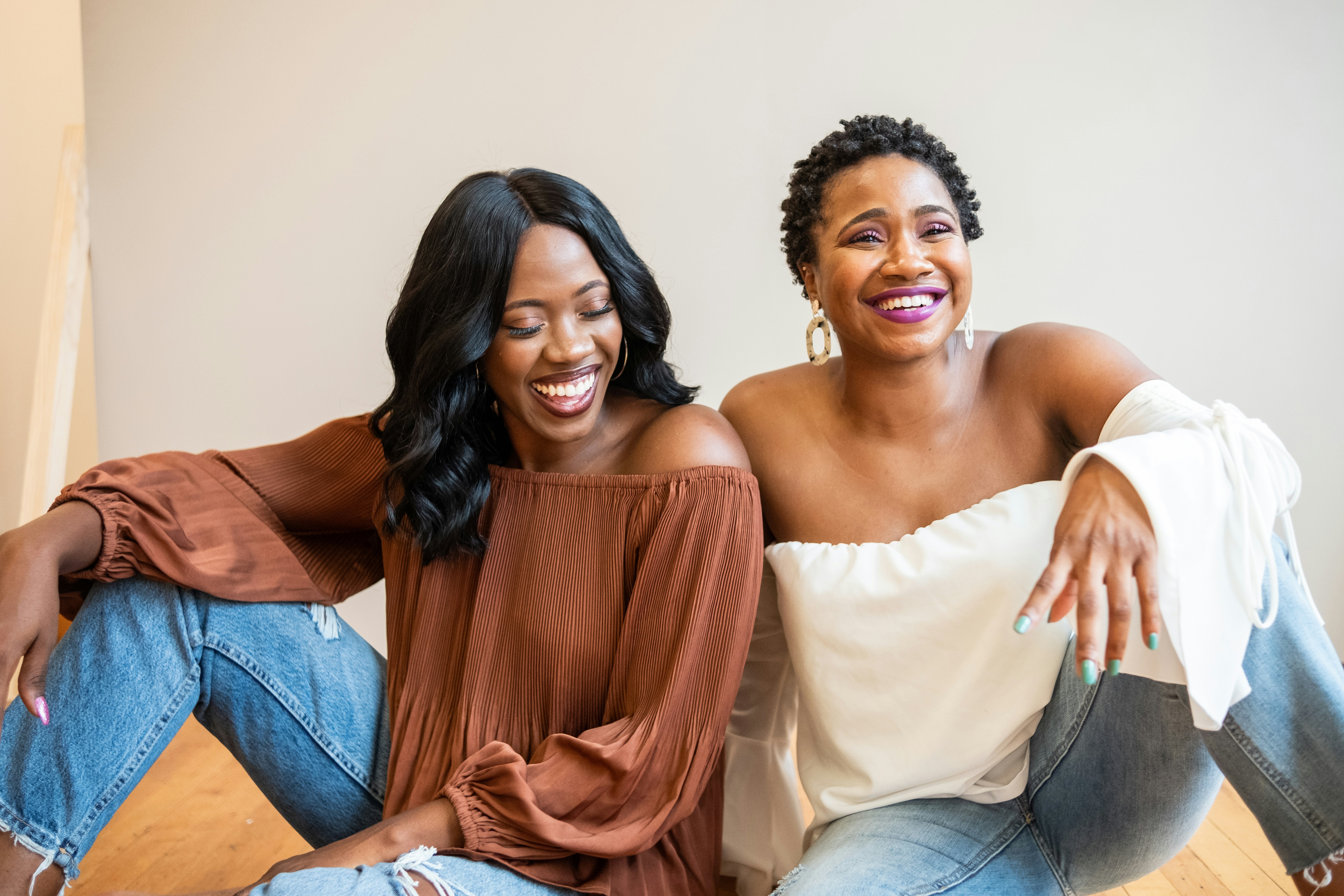 Two Black women smiling