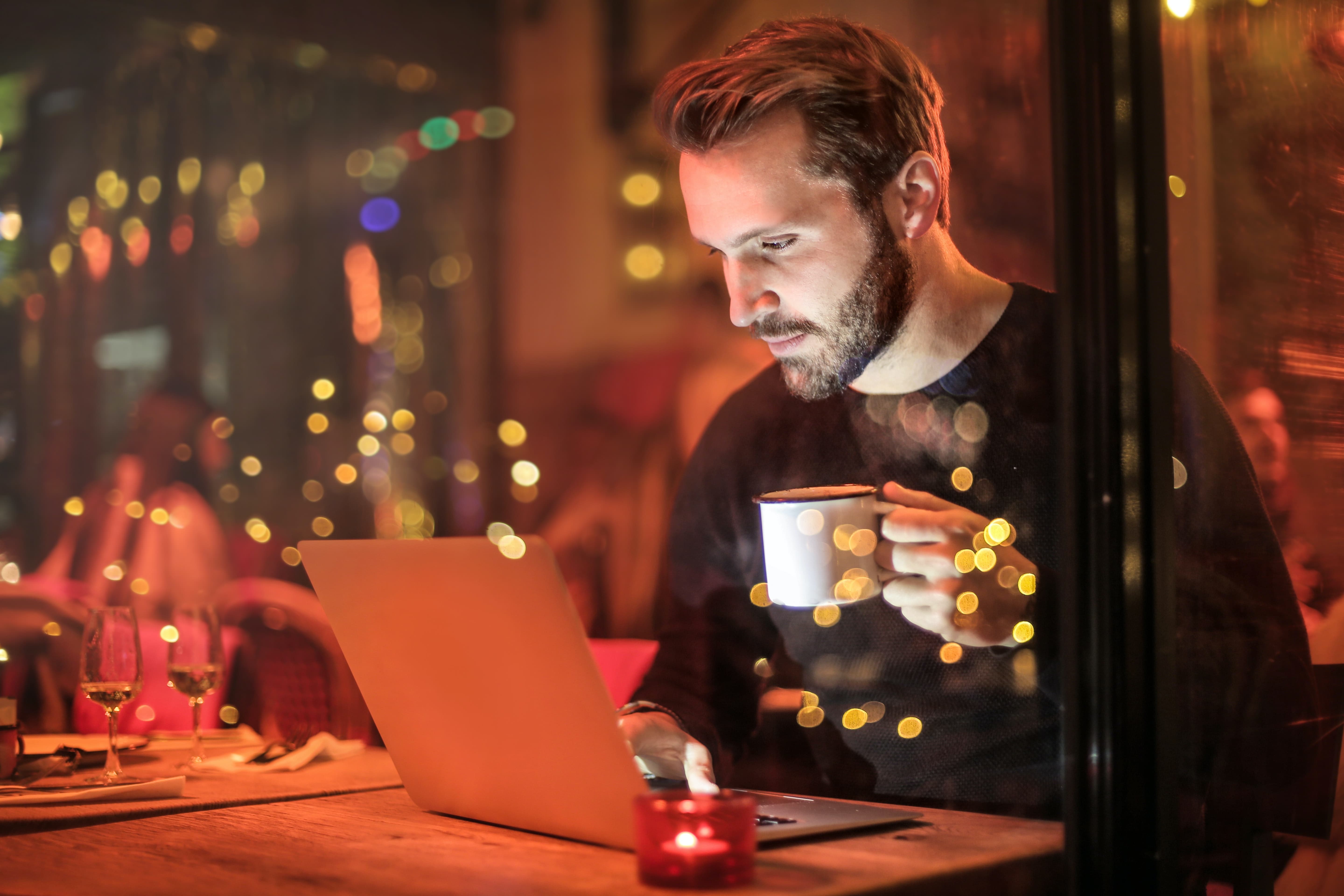 man at laptop learning schema therapy