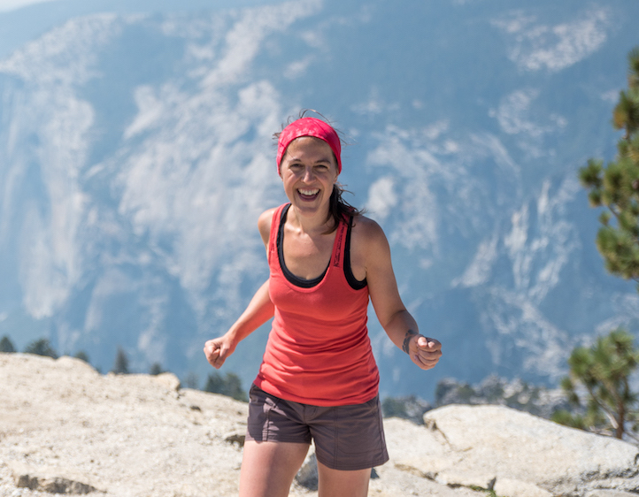 female travel blogger hiking in Yosemite National Park