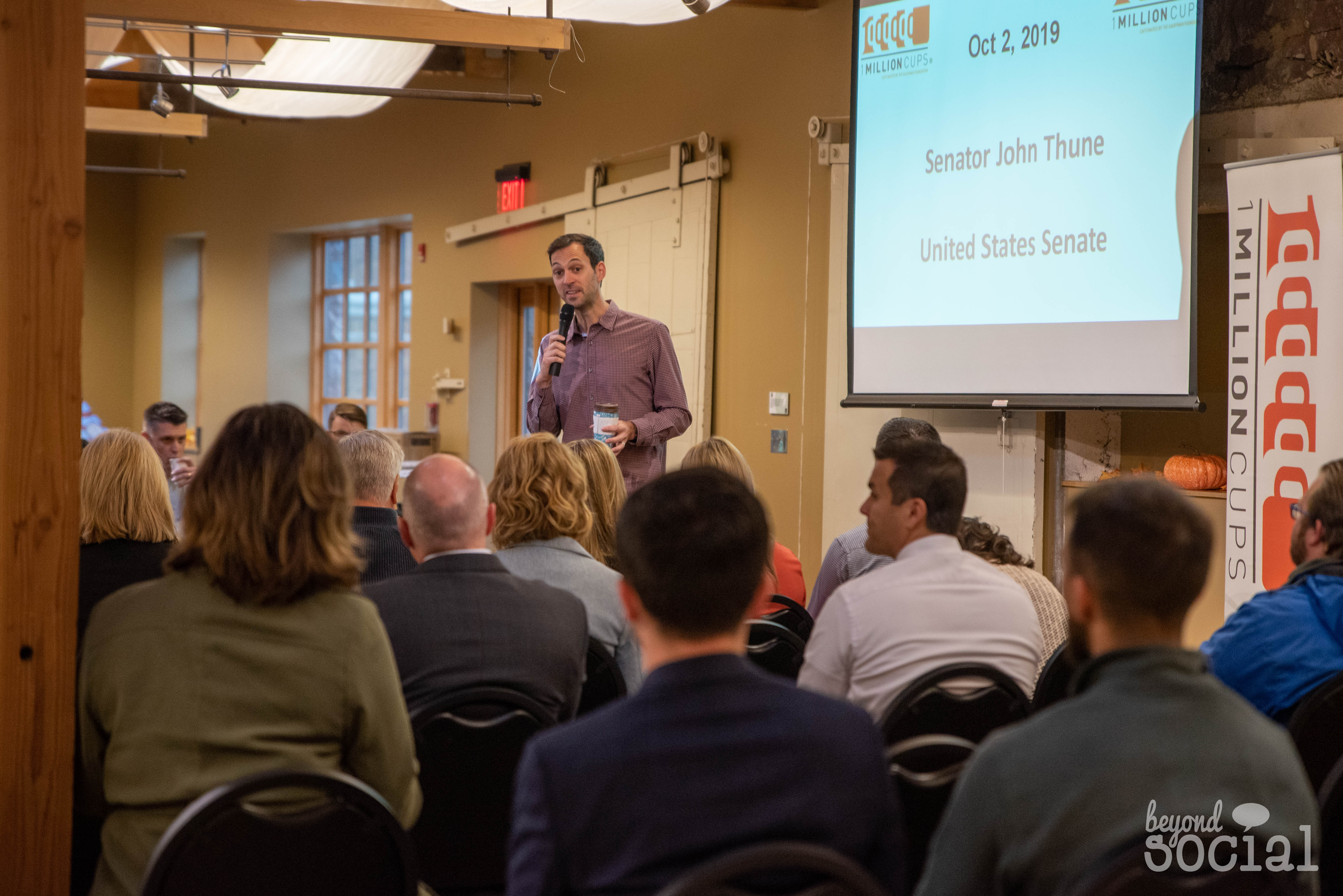 John T. Meyer presenting at a business conference