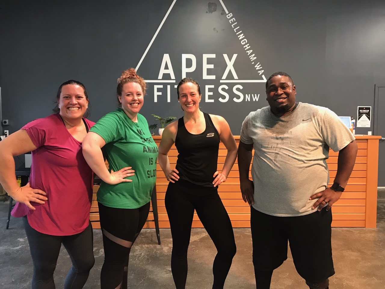 Chef and Coach Siiri Sampson smiles with a group of her 6 week program after they all participate in a workout together.