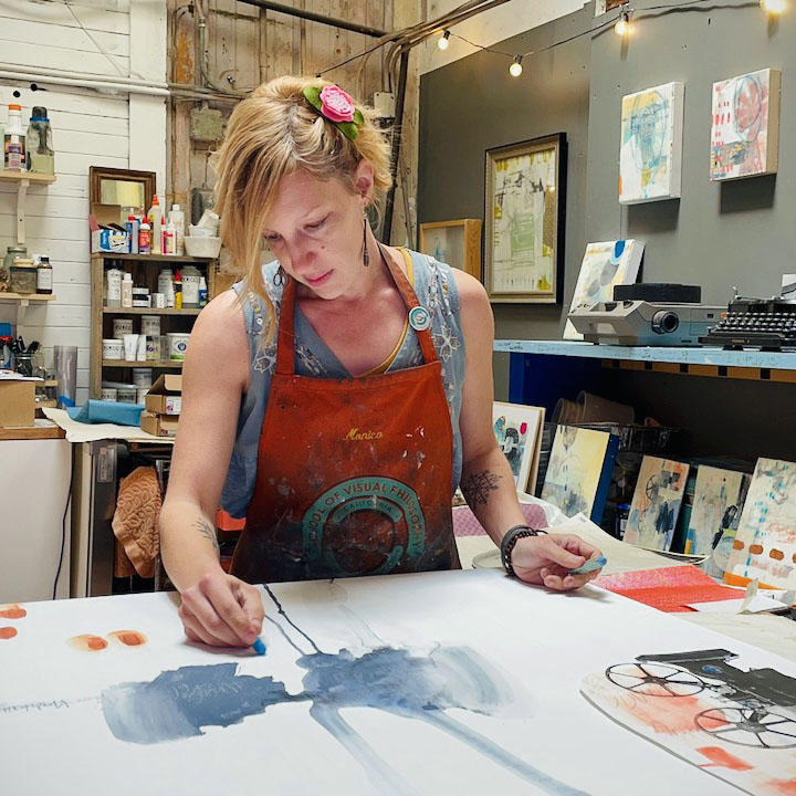 Dana Harris Seeger painting in her studio
