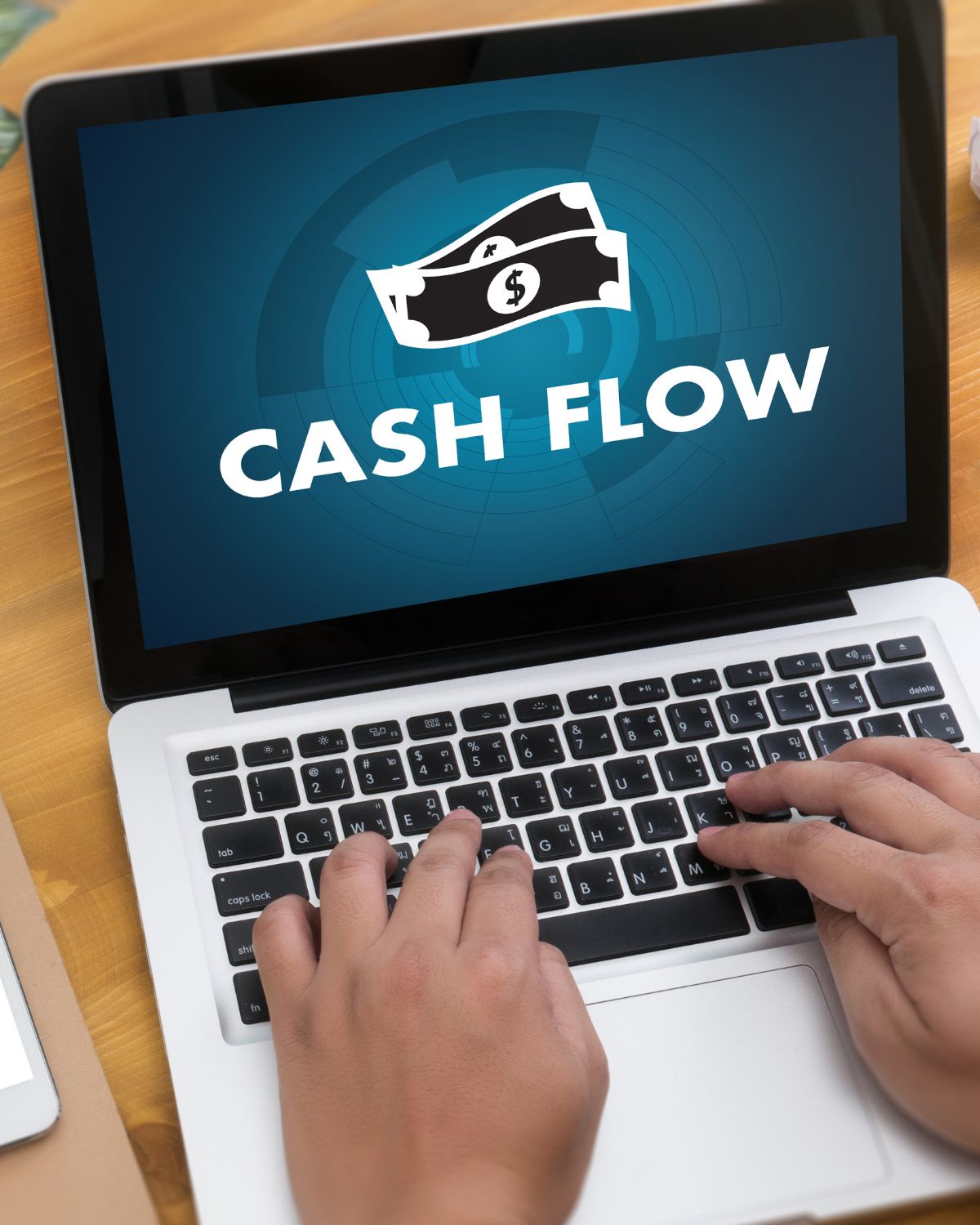Image of the word cashflow on a laptop