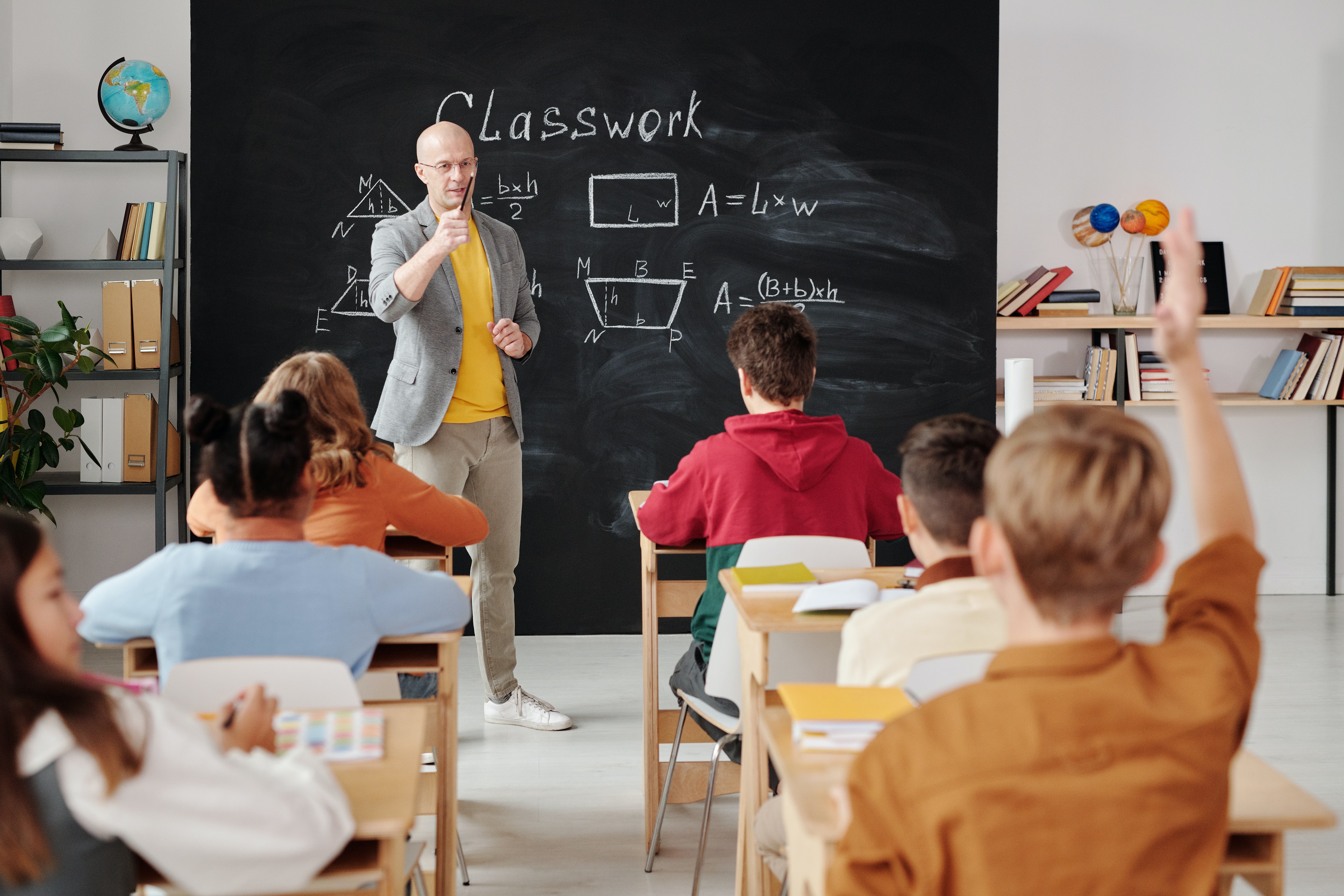 teacher standing in front of classroom