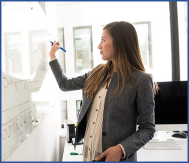 Woman at whiteboard