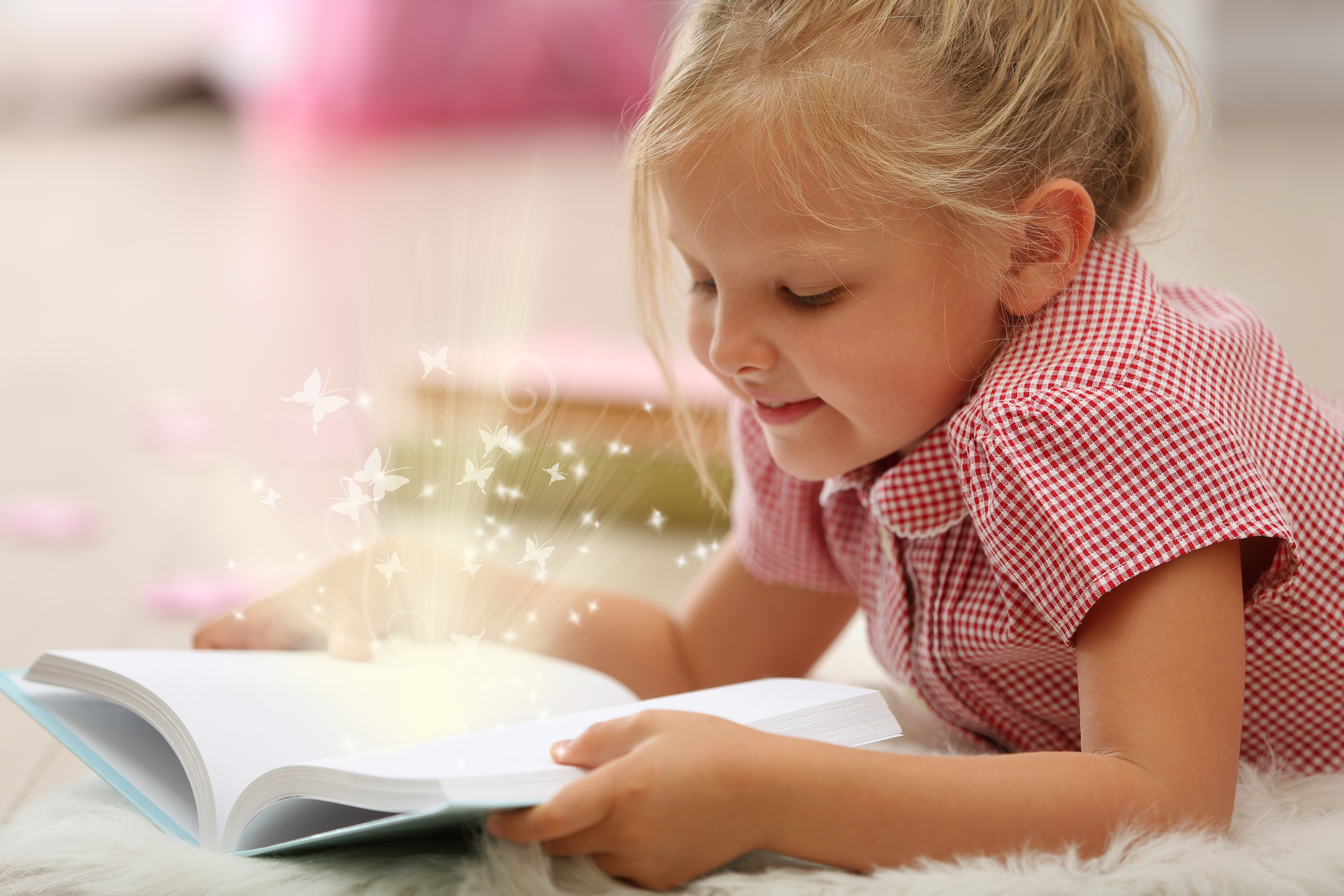 Young girl reading a book