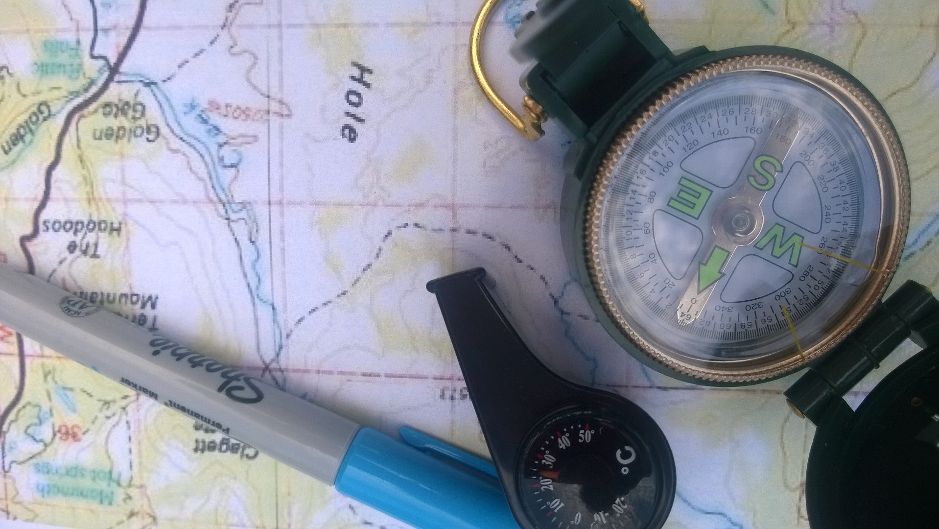 map, compass, emergency whistle