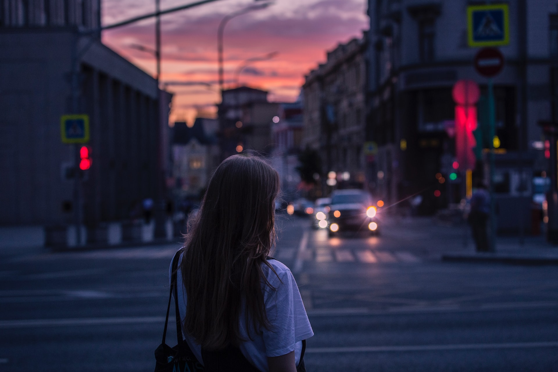 woman alone at night in city