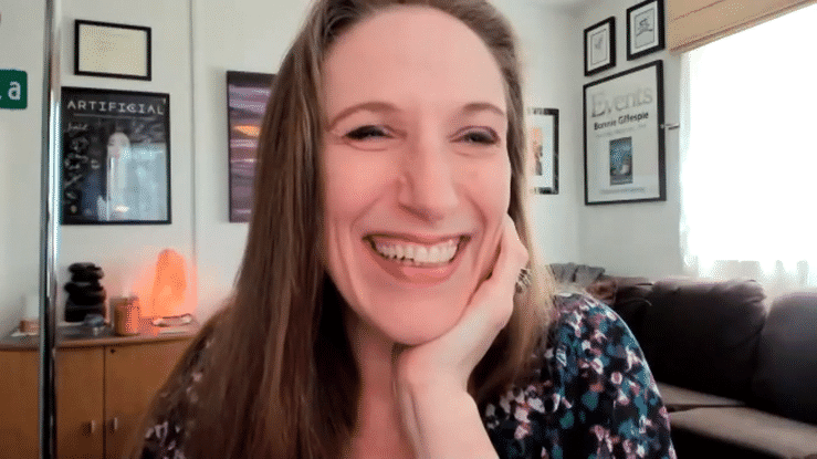 smiling, laughing animated GIF of Bonnie Gillespie, middle-aged white cis female with long reddish hair