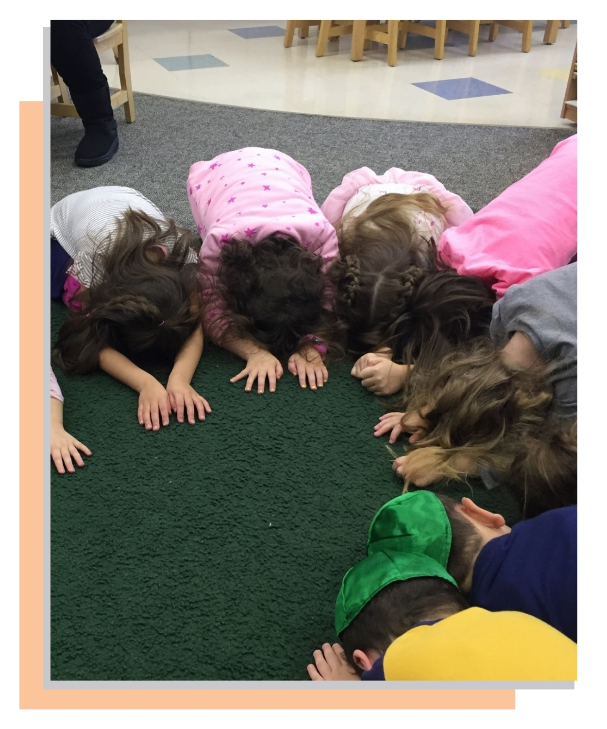 Yoginos instructor guiding student in Balasana or Child&#39;s Pose