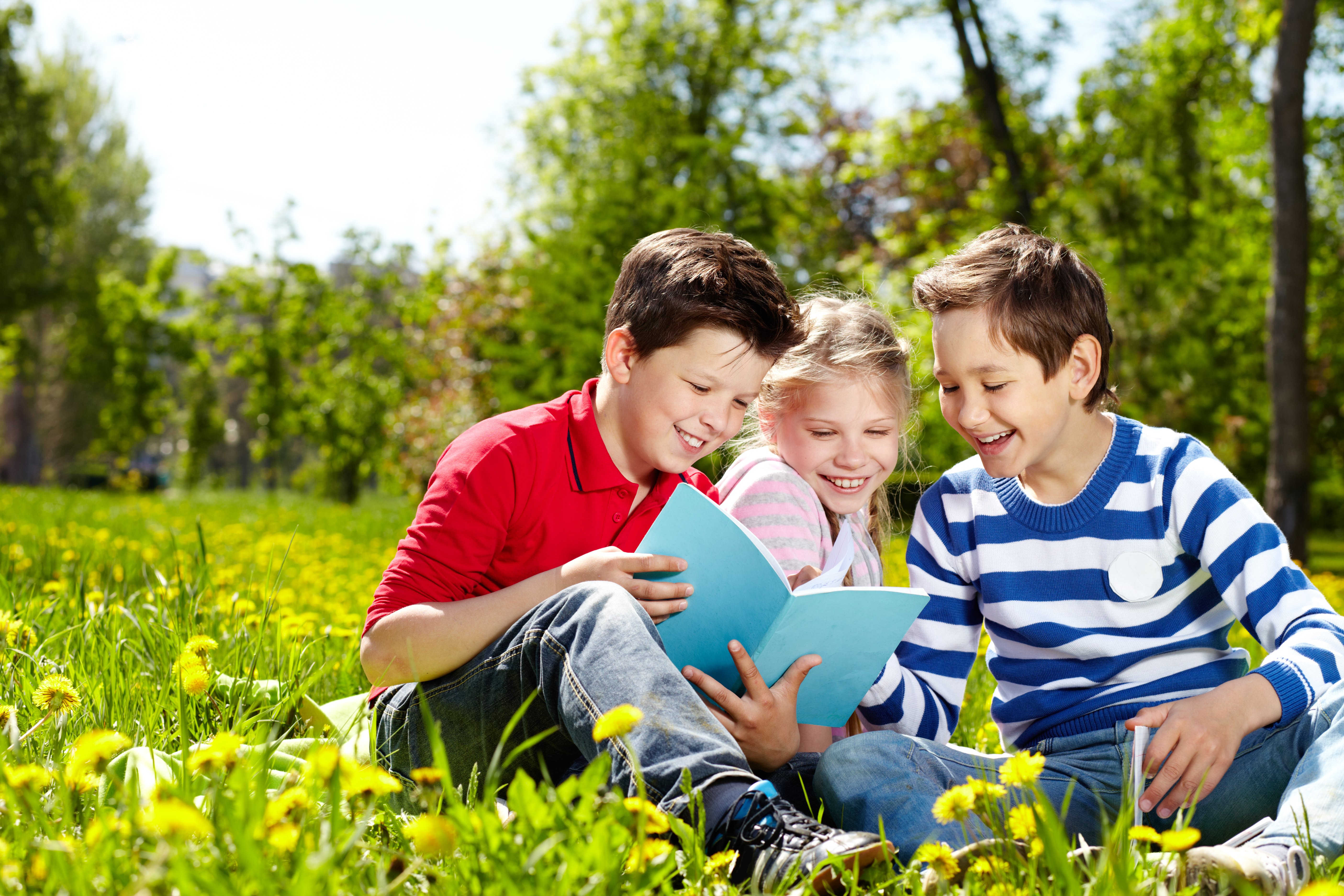 Kids outside reading