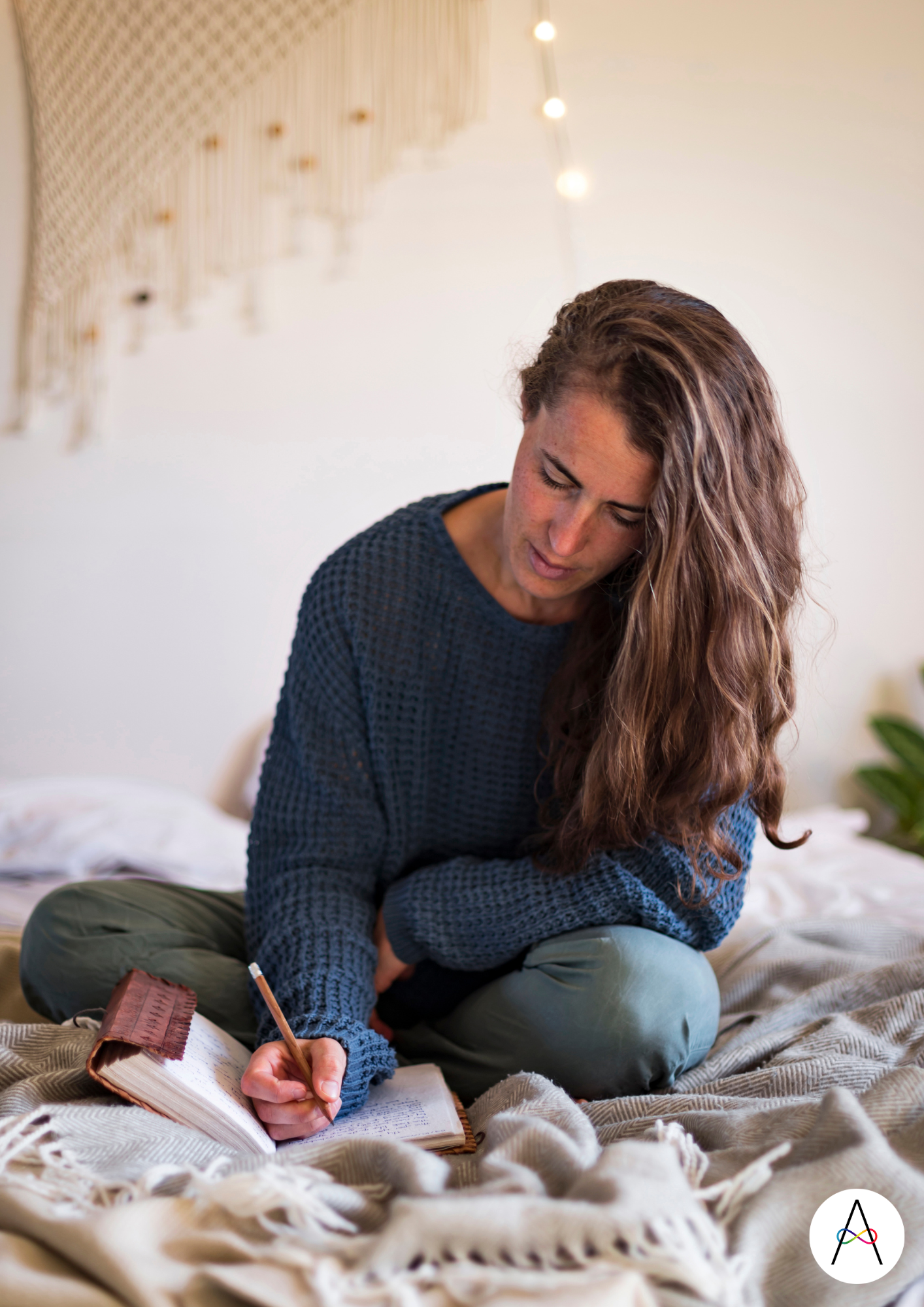 picture of woman writing in journal