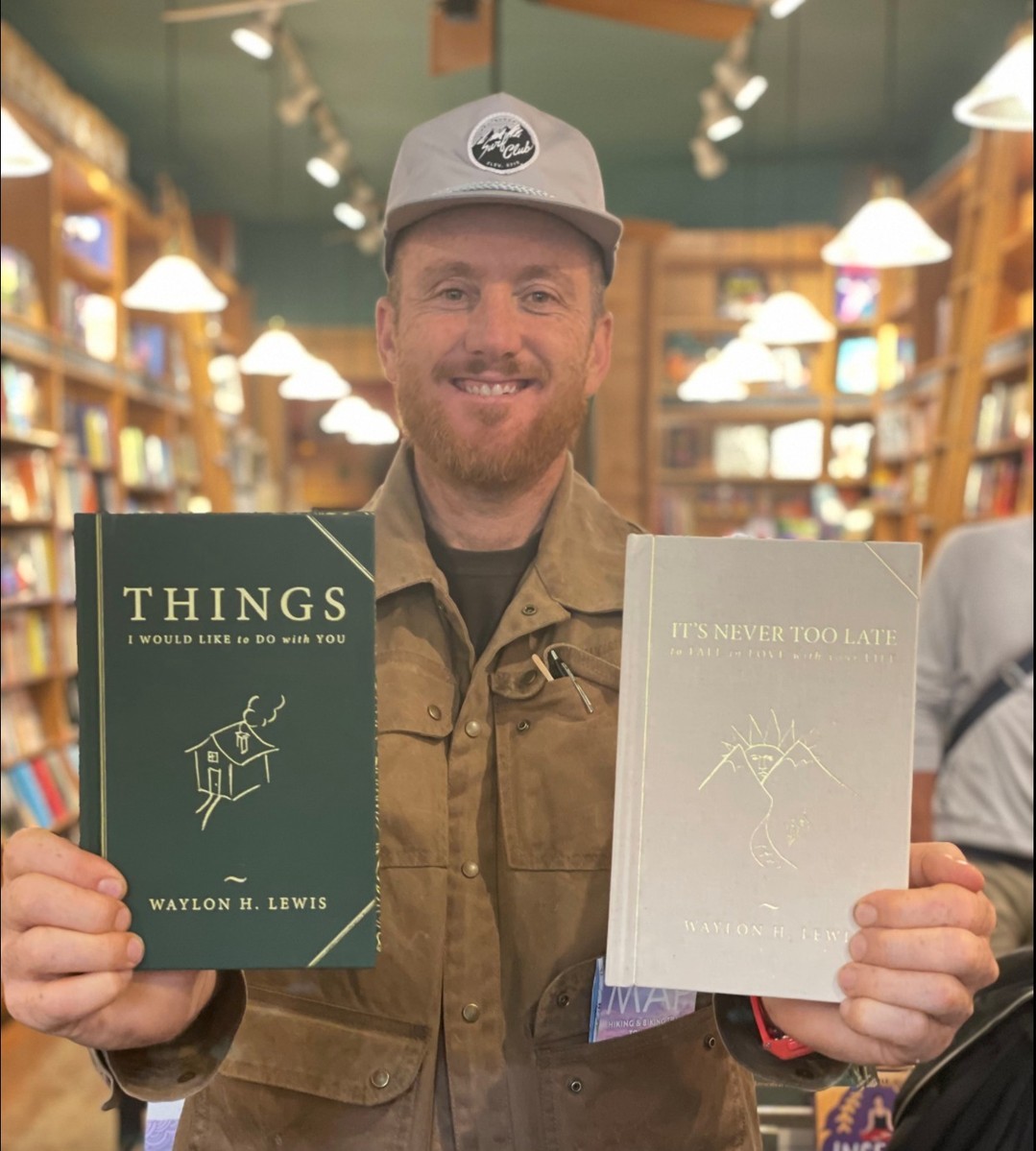 Waylon Lewis with his two books.