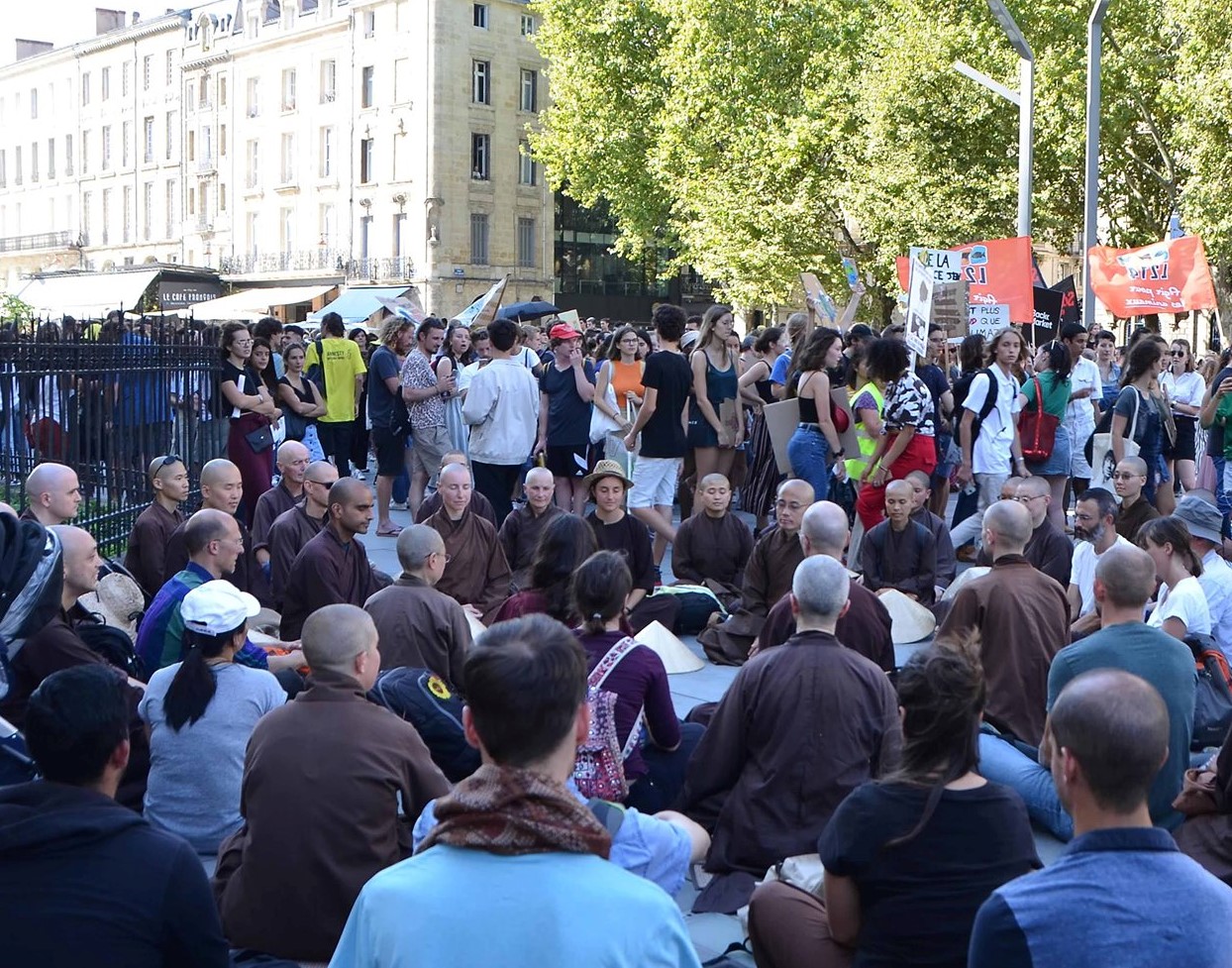 Monastics and friends meditating at the Climate March in Bordeaux, September 2019