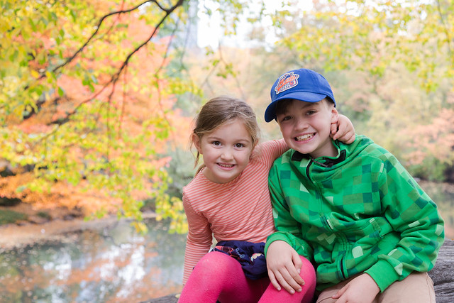 three kids smiling