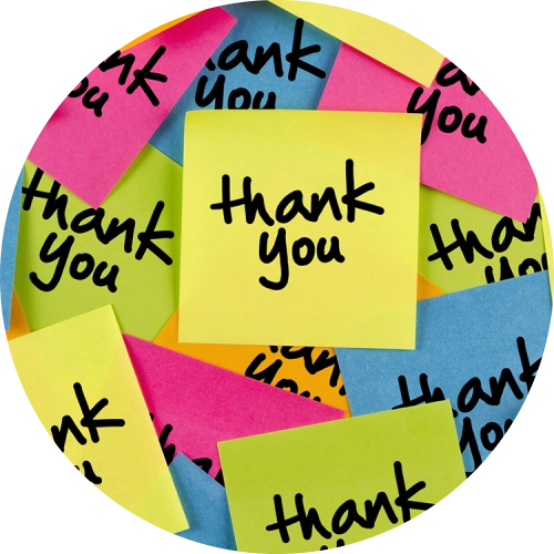 There are numerous sticky notes with the words thank you on them.