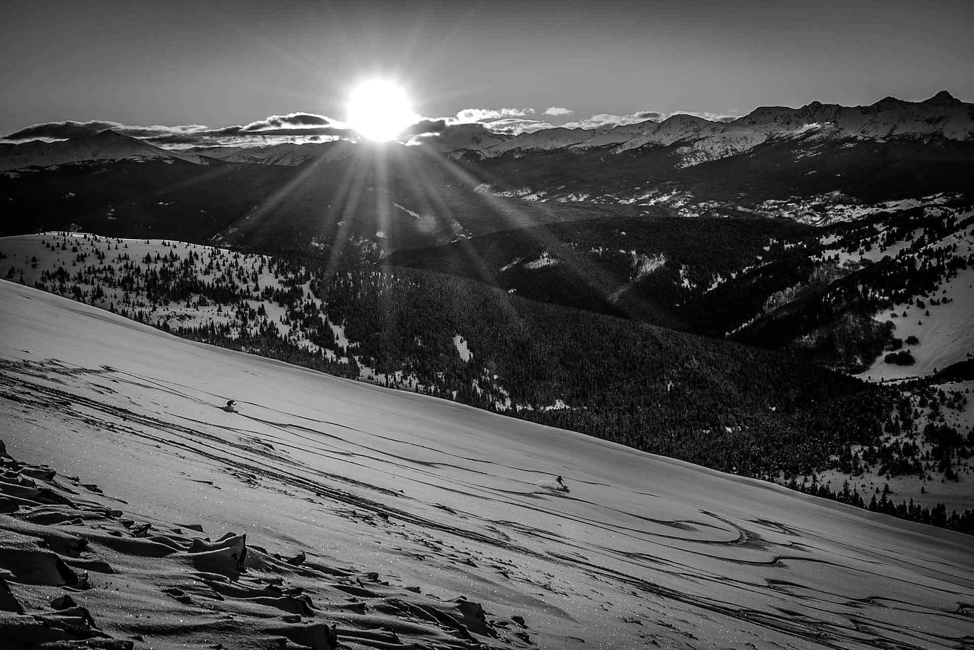 Skiers in the sunset