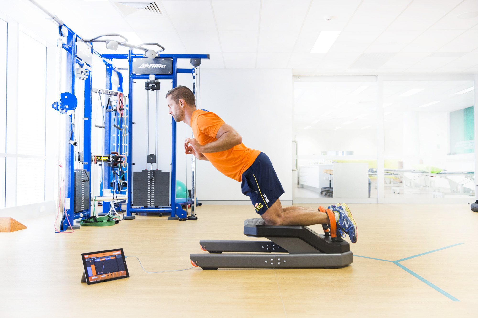 Man doing Nordic Hamstring Curls to recover from a hamstring injury. 