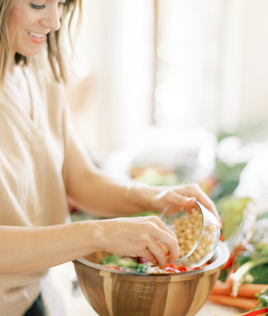 Kara Swanson making a salad