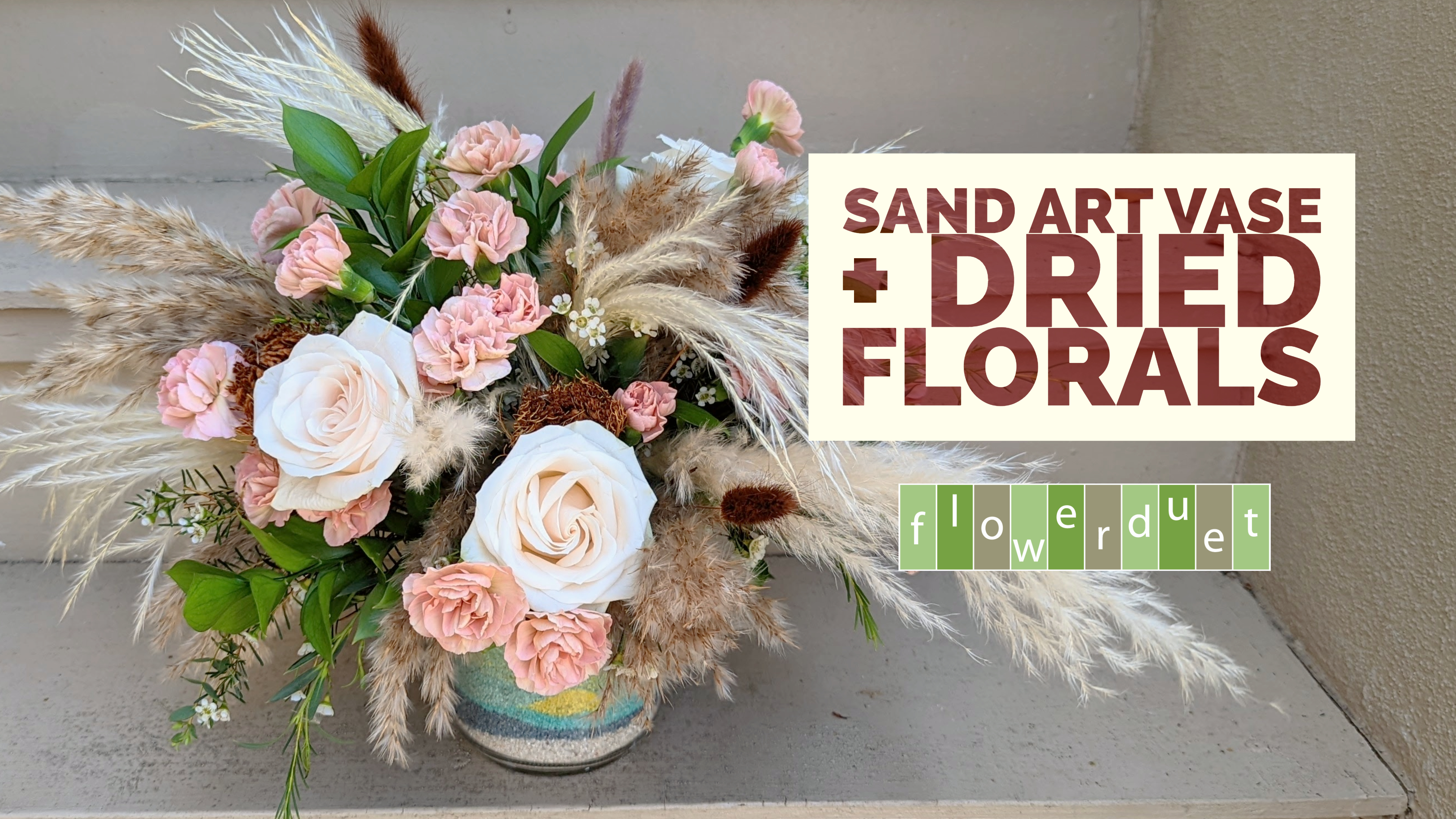 Fresh flowers on top of sand art vase