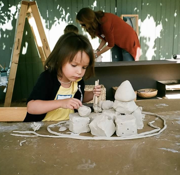 girl with clay