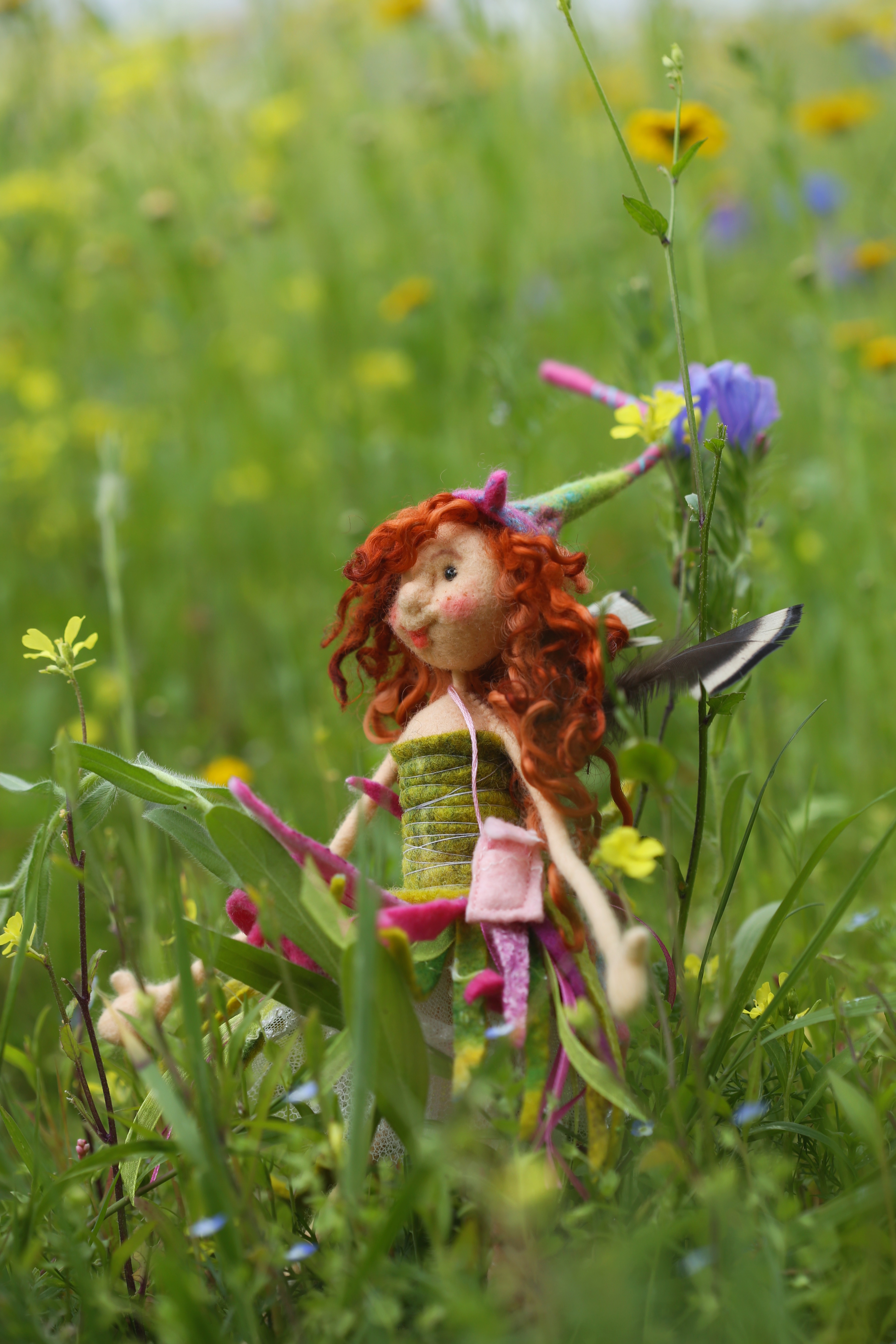 wool fairy in a flower field