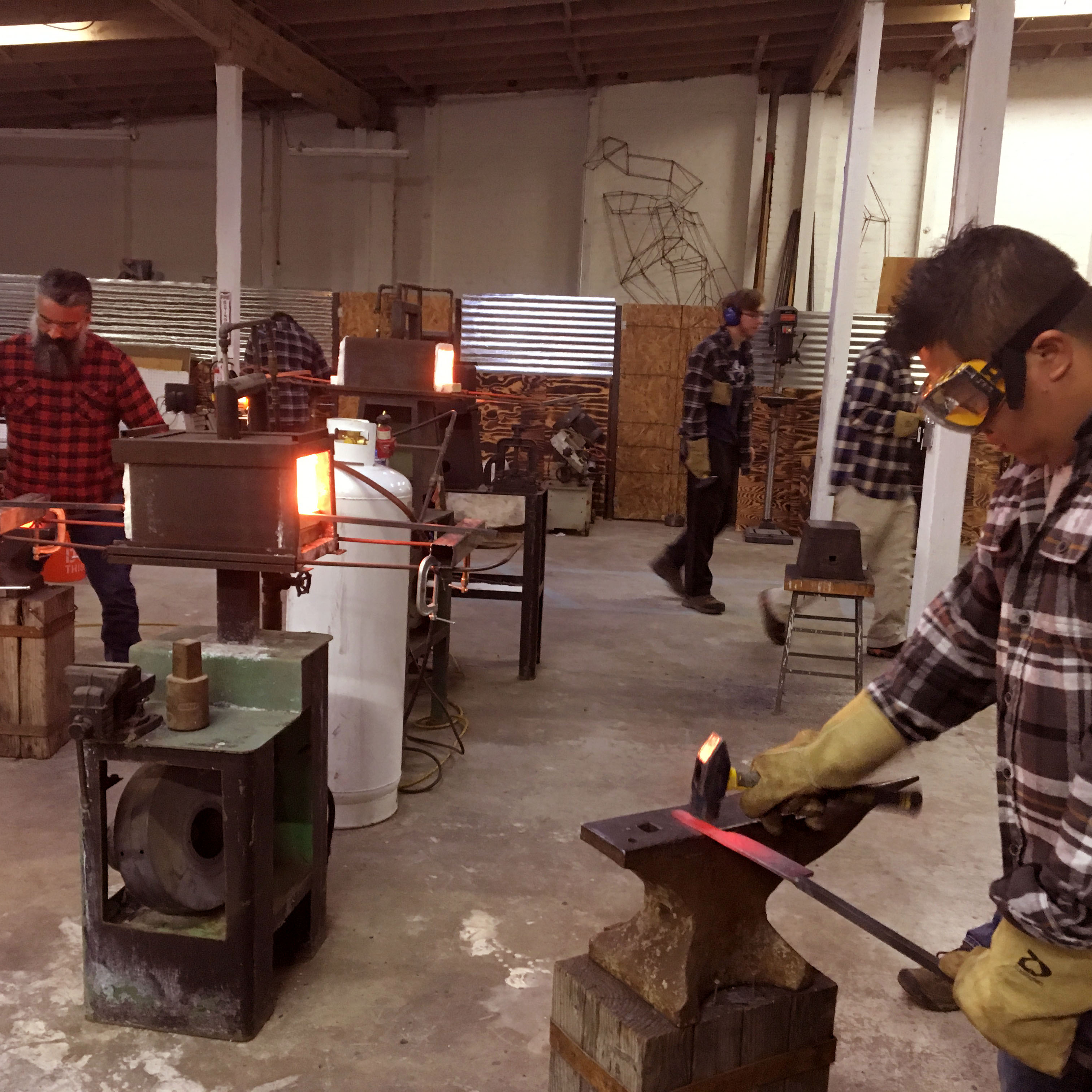 students studying in the School of Visual Philosophy Hot Shop