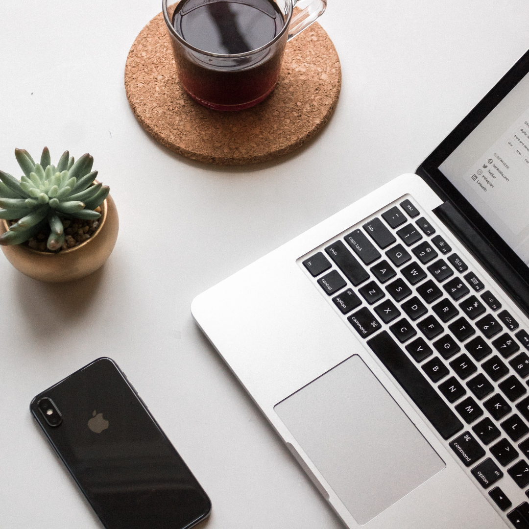 Office-Desk-Laptop-Phone-Coffee-Small-Plant