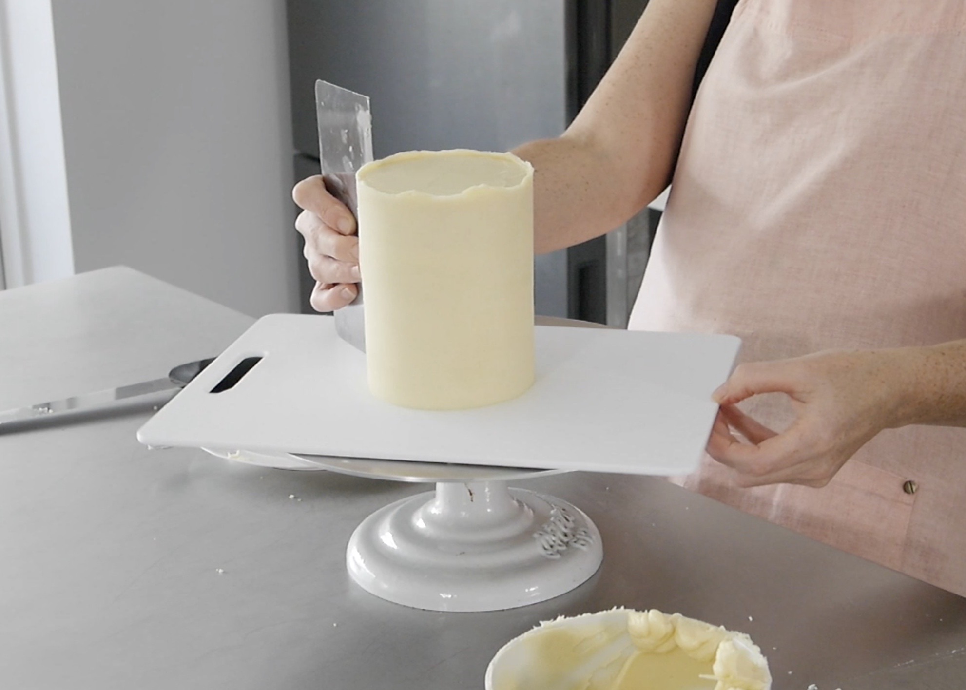 Covering cake in ganache